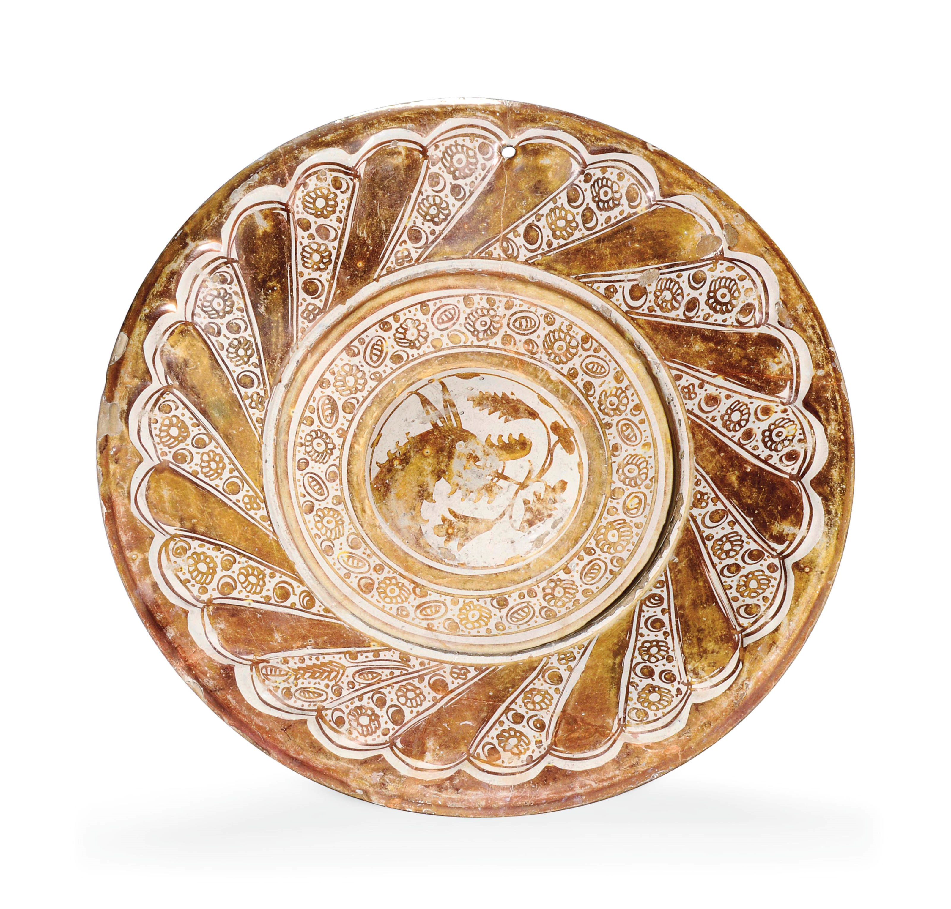 AN HISPANO-MORESQUE COPPER-LUSTRE CHARGER
