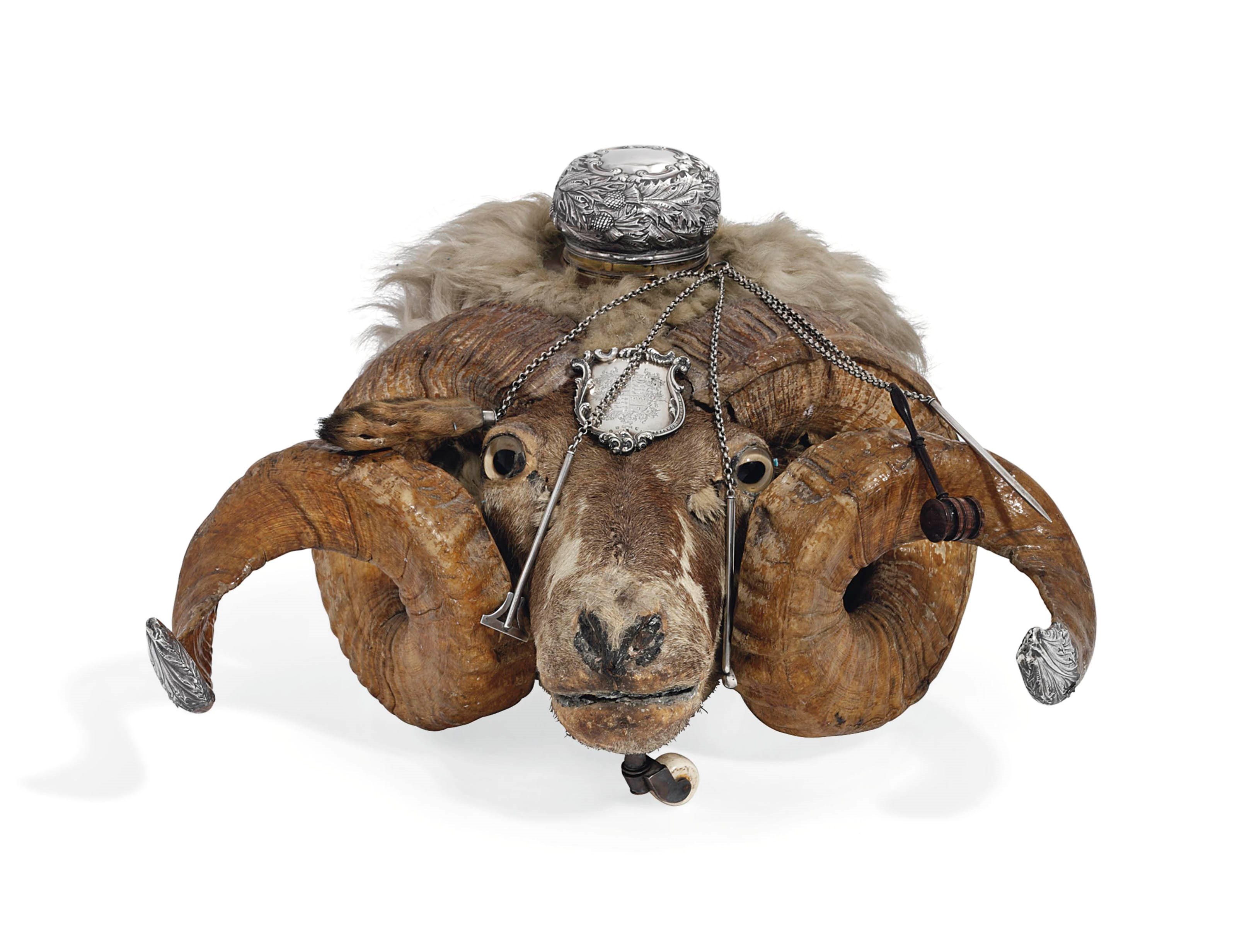 A VICTORIAN SCOTTISH SILVER-MOUNTED RAM'S HEAD TABLE SNUFF-MULL