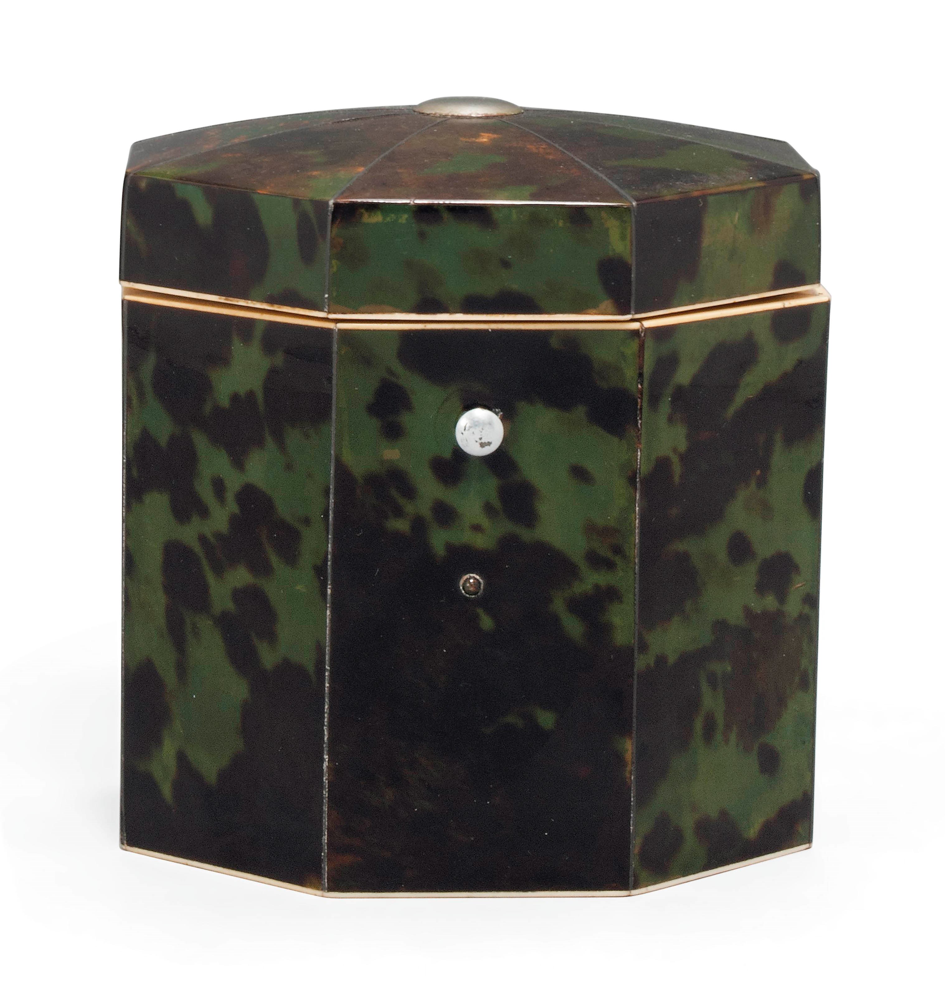 A REGENCY OCTAGONAL GREEN-STAINED TORTOISESHELL TEA CADDY