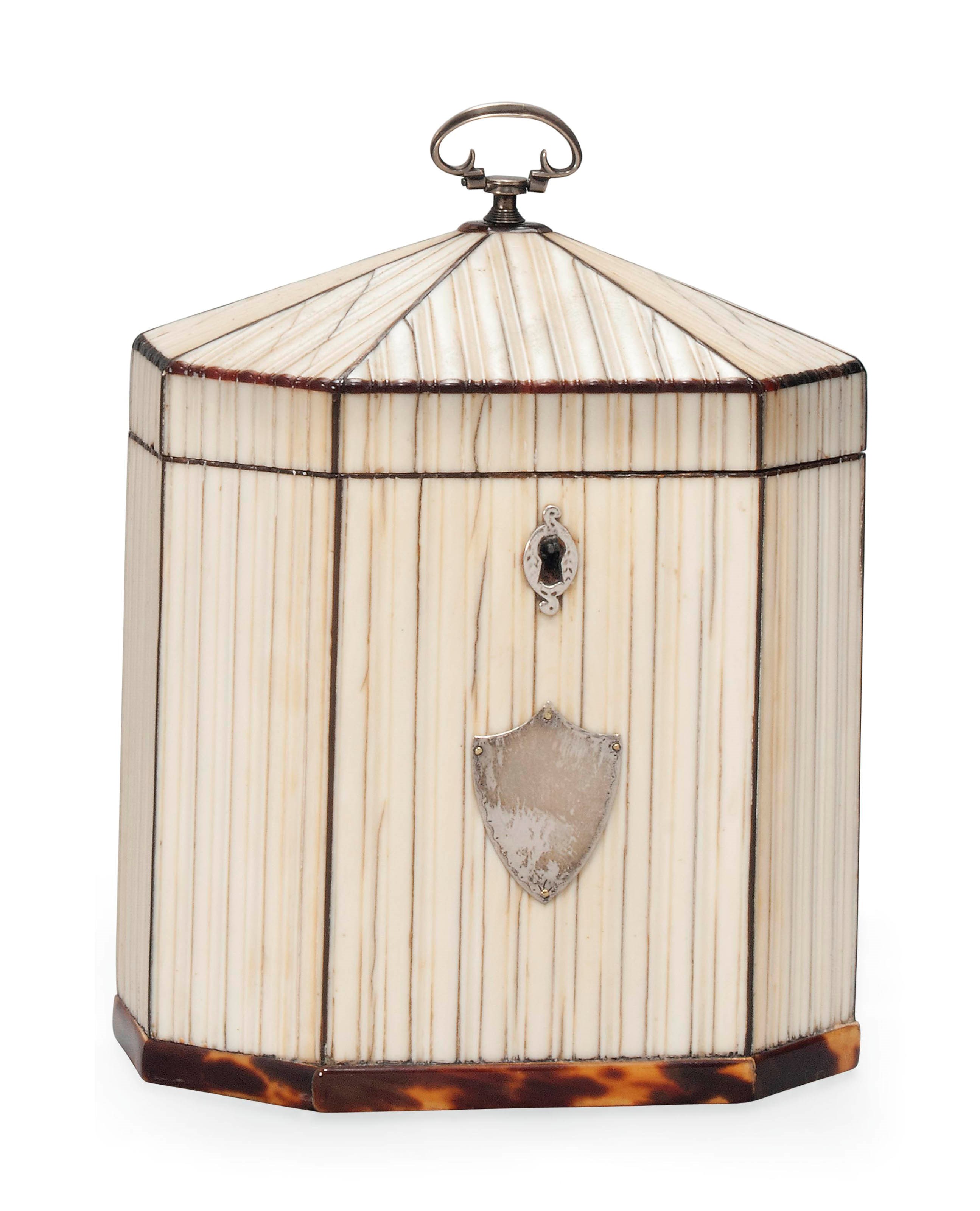 A GEORGE III RIBBED IVORY TEA CADDY