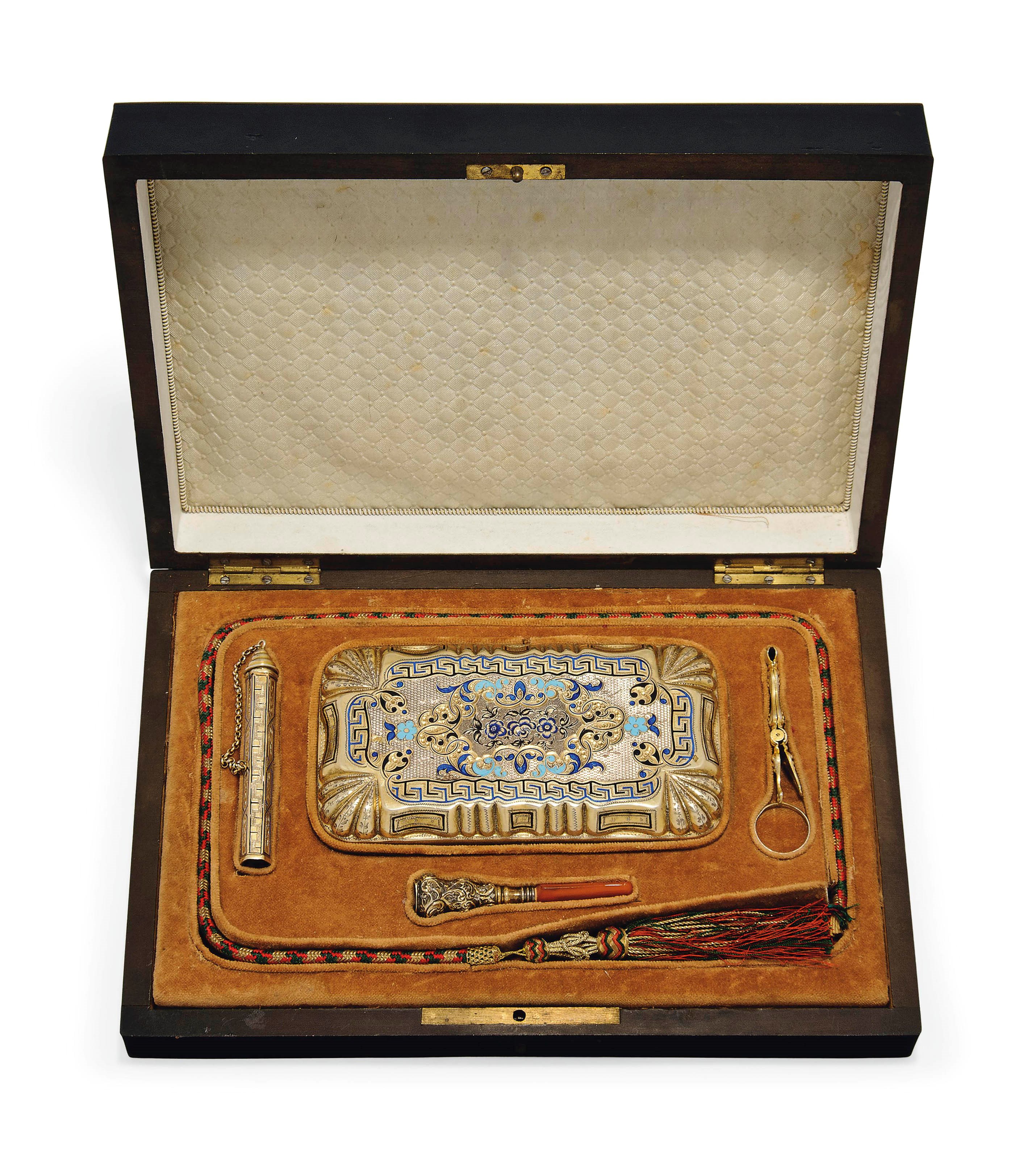A FRENCH SILVER-GILT AND ENAMEL SMOKER'S COMPENDIUM POSSIBLY MADE FOR THE TURKISH MARKET