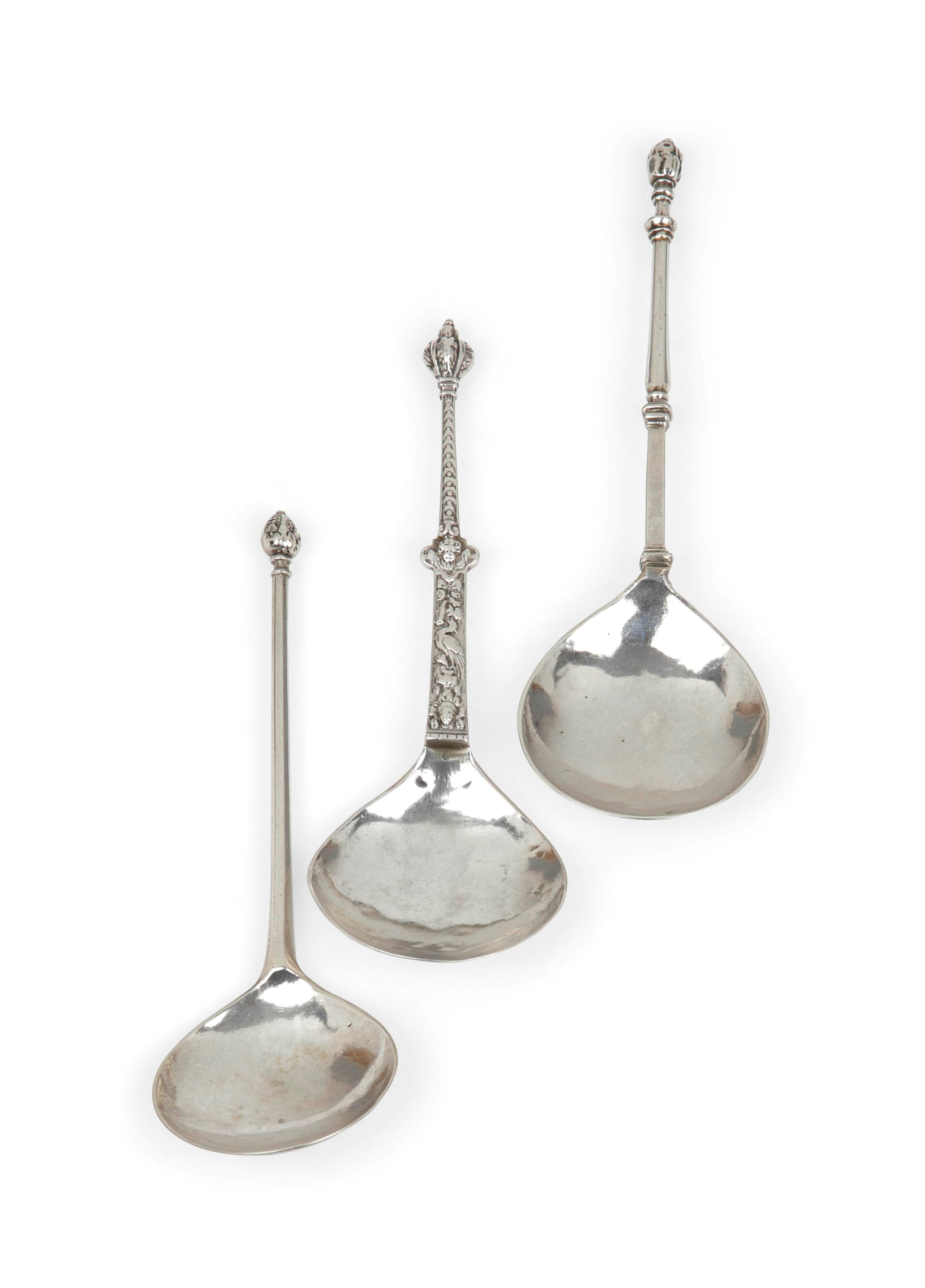 Three Dutch silver spoons with flower-bud finials