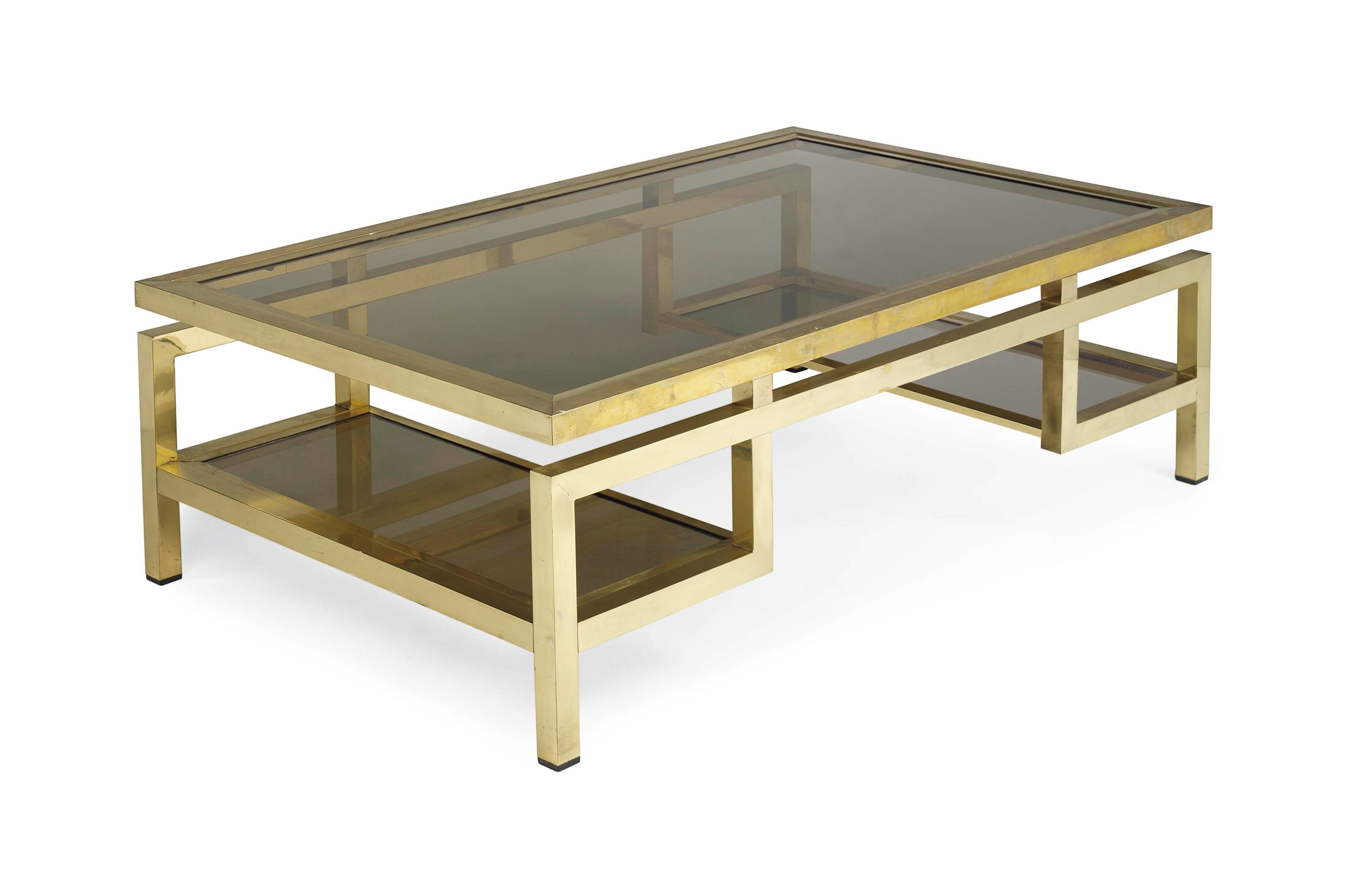 A BRASS AND GLASS COFFEE TABLE