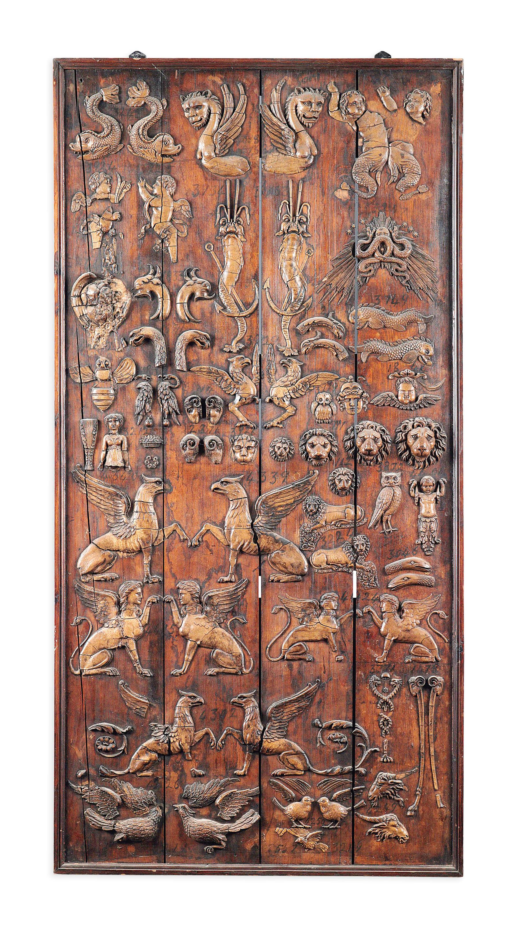 A BOARD OF PLASTER RELIEF SAMPLES