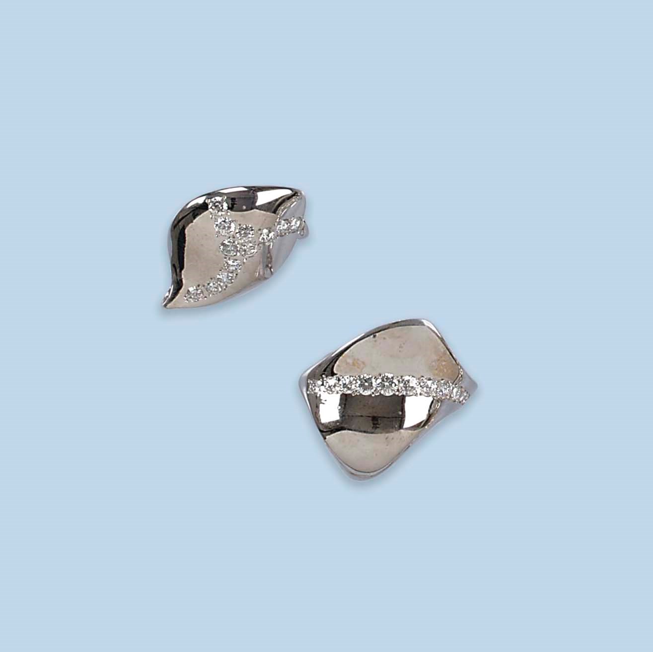 SEVEN DIAMOND-SET RINGS