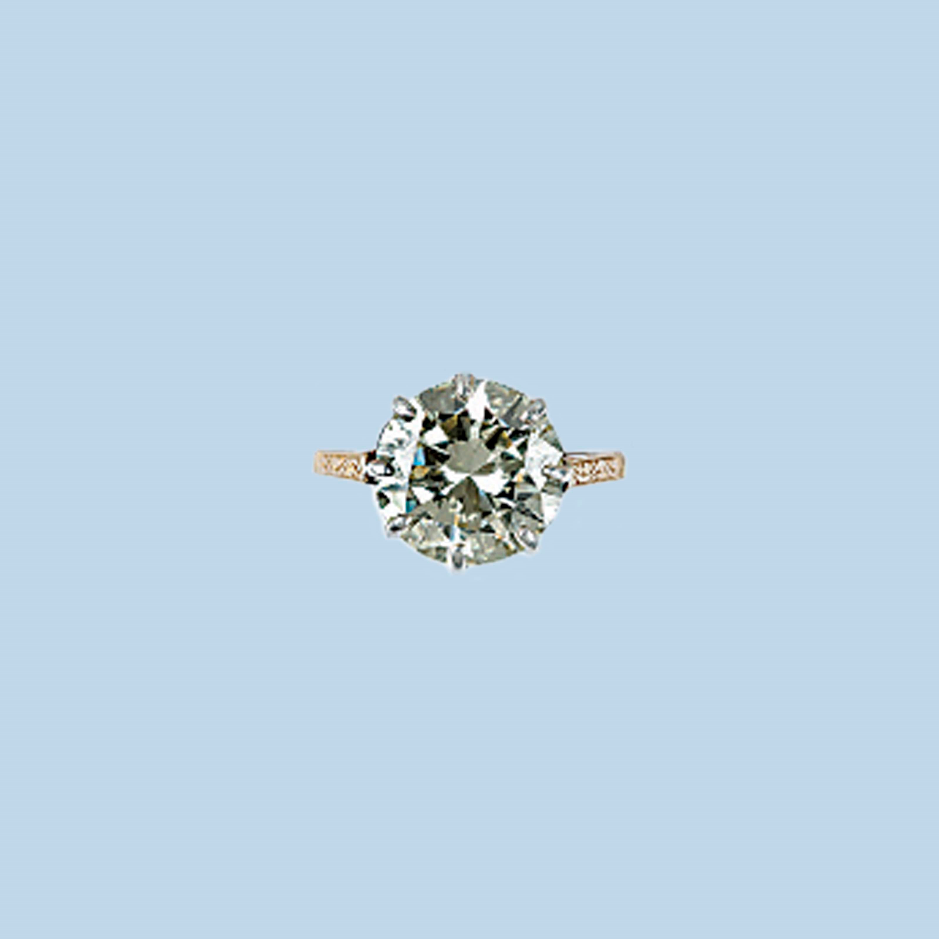A DIAMOND SINGLE STONE RING