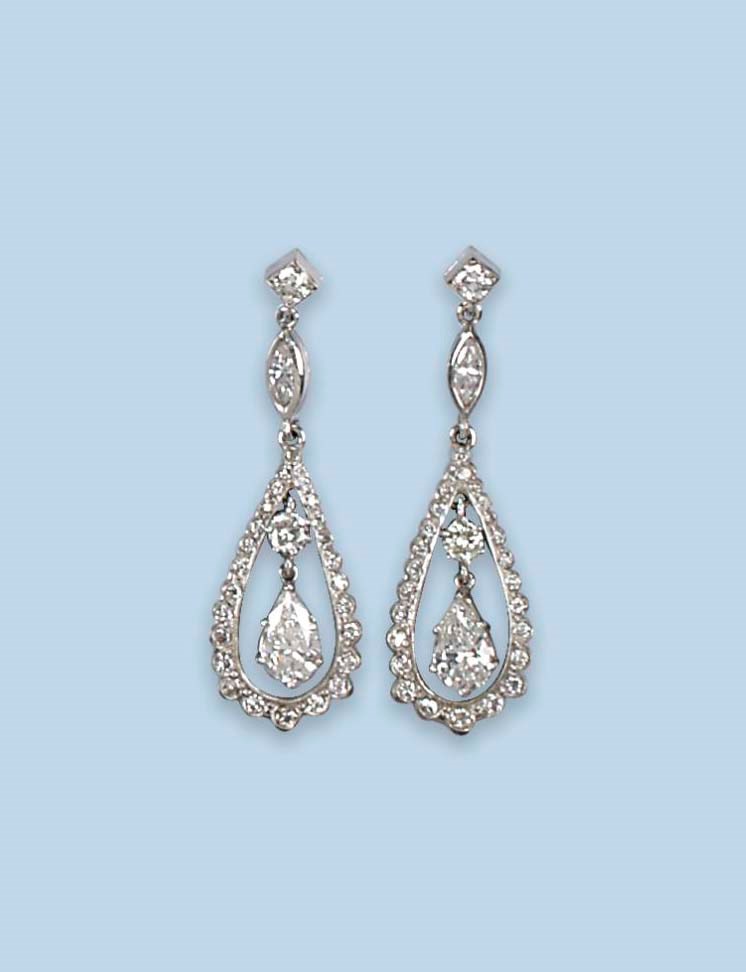 A PAIR OF DIAMOND EARRINGS