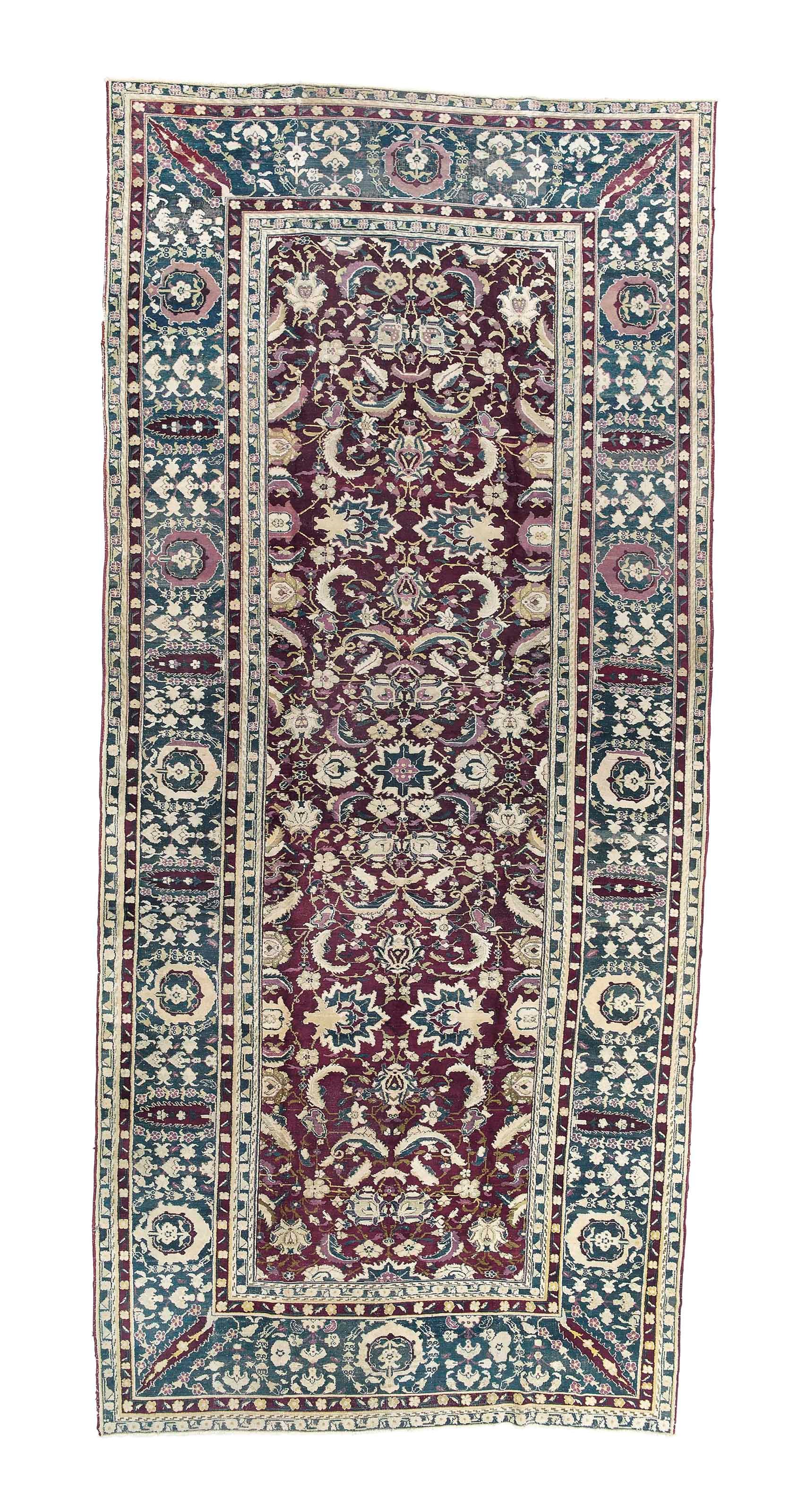 An antique Agra carpet