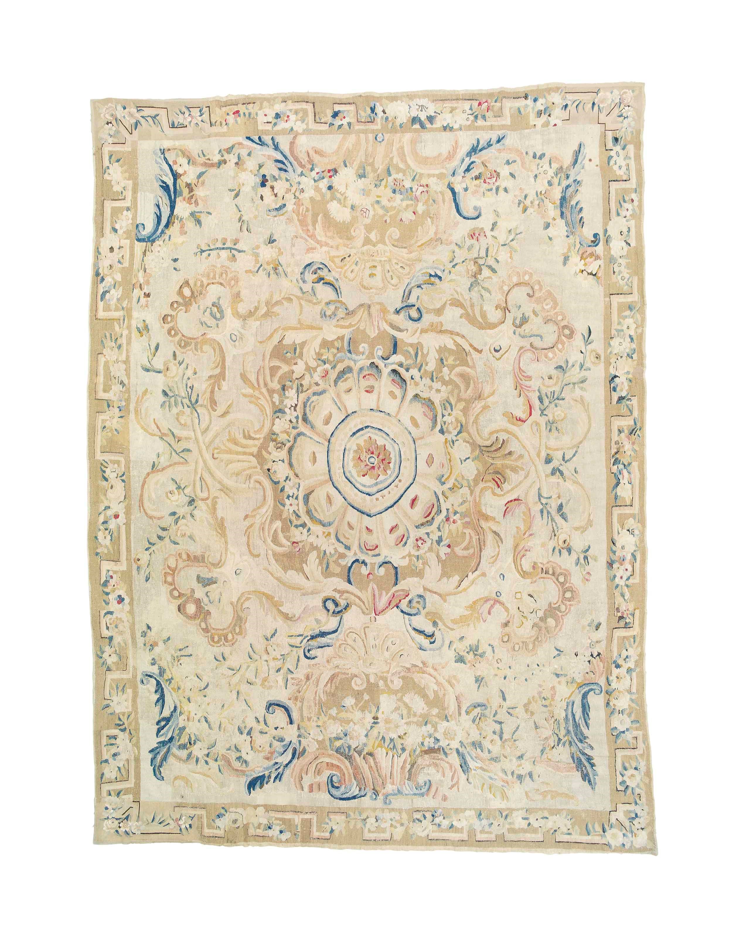 An antique Aubusson carpet