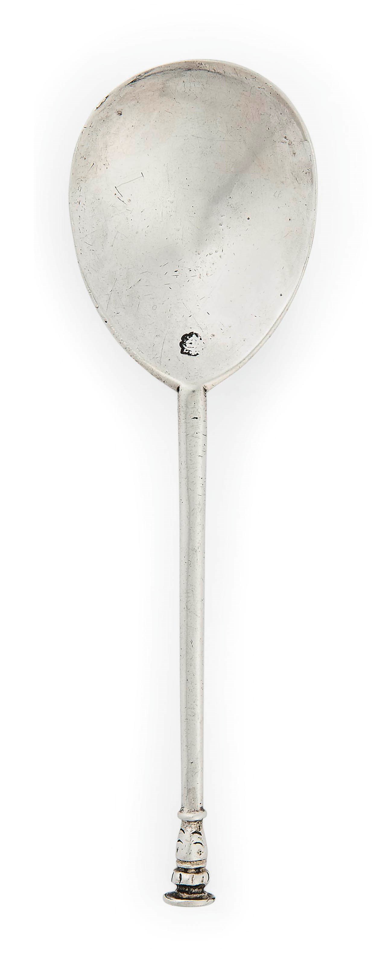 A JAMES I PARCEL-GILT SILVER SEAL-TOP SPOON