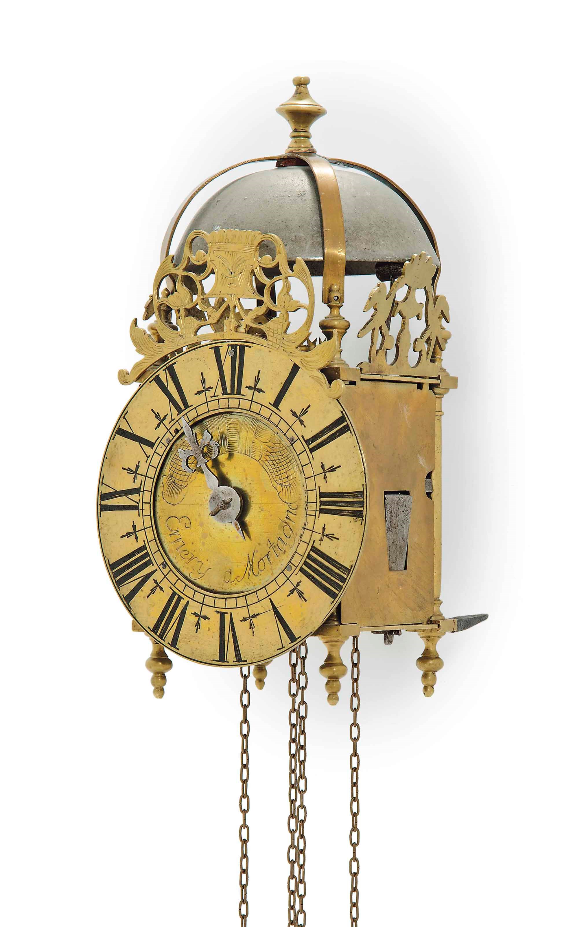 A BRASS LANTERN CLOCK
