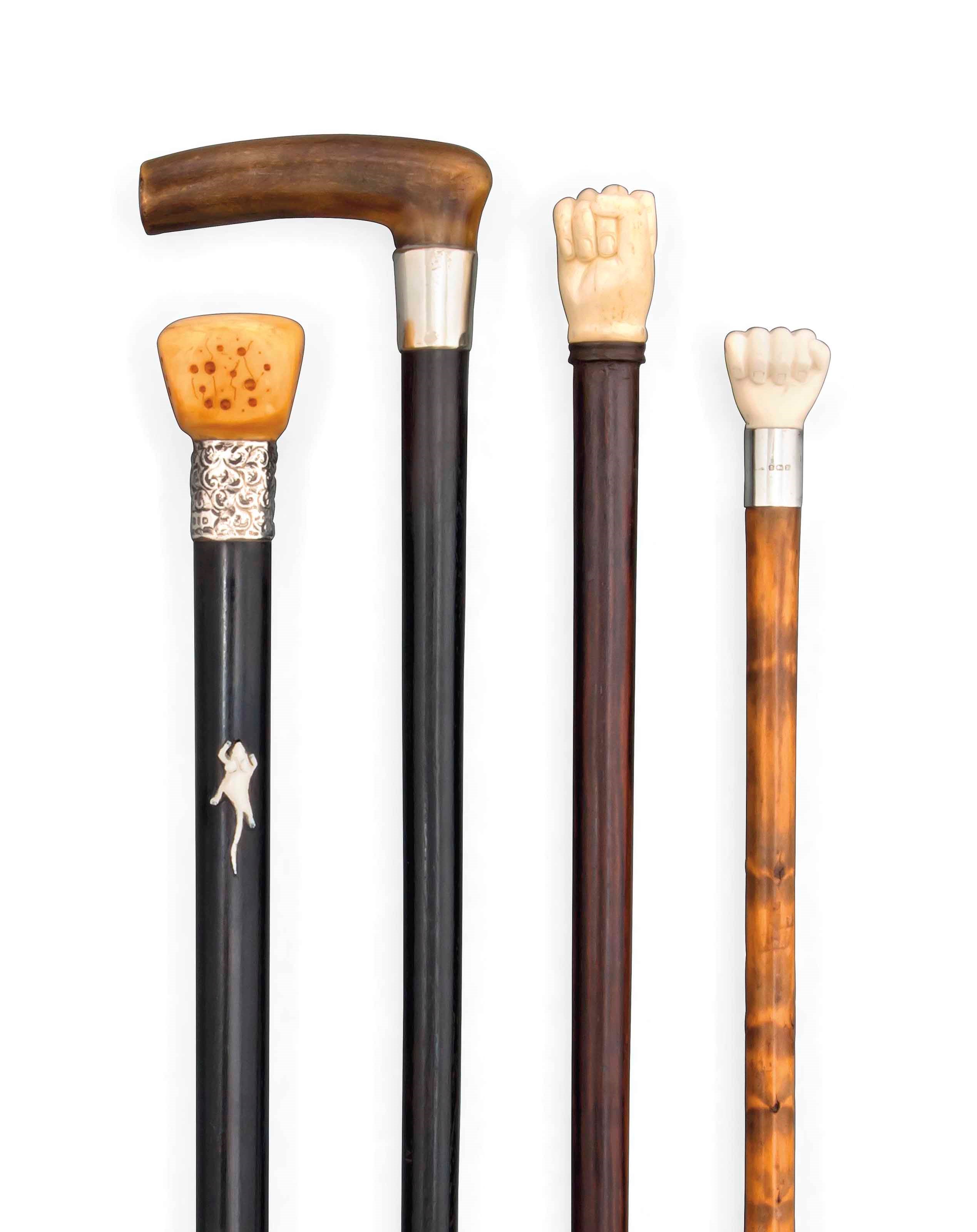 A GROUP OF FOUR ENGLISH NOVELTY WALKING STICKS