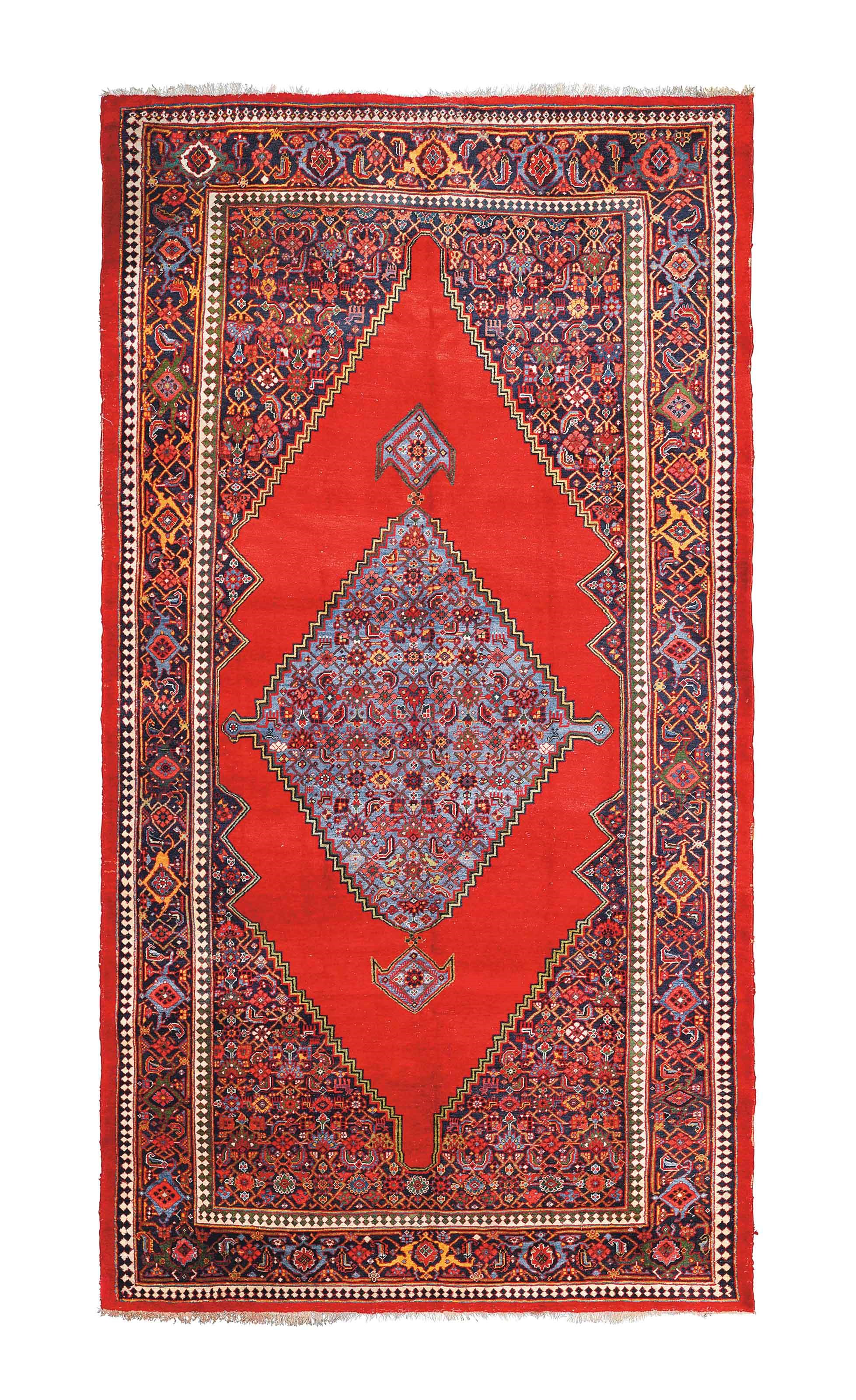 An antique Bijar carpet