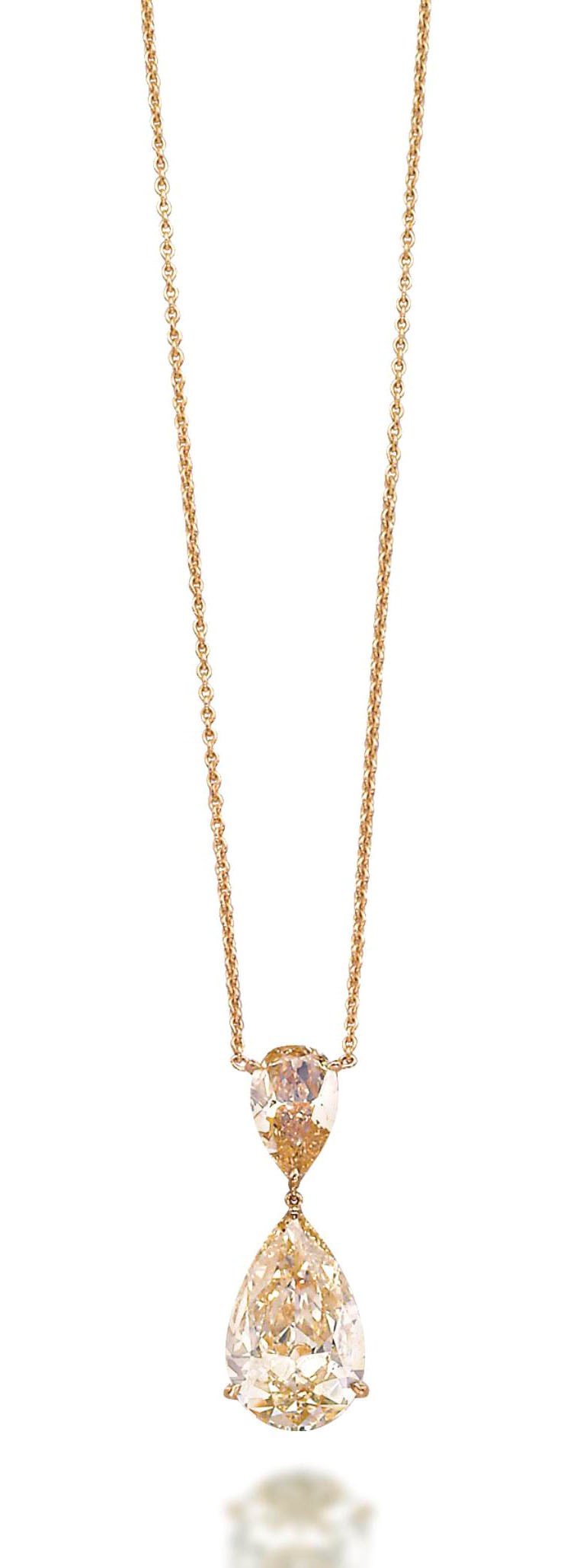 A COLOURED DIAMOND NECKLACE