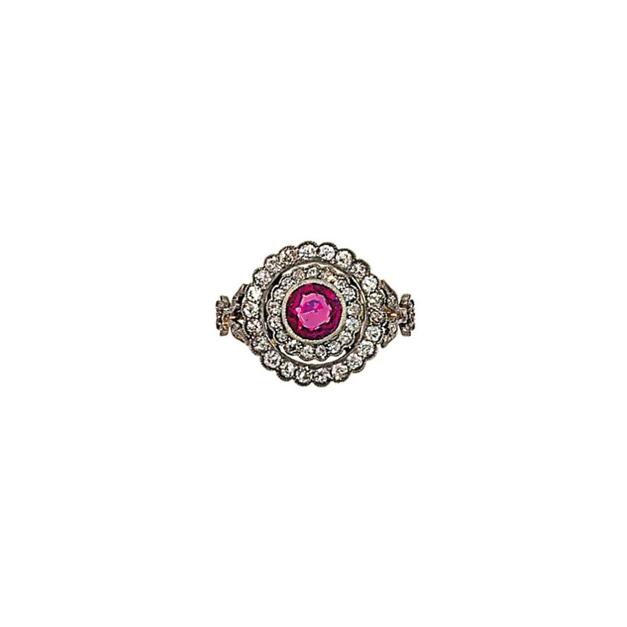 A pink sapphire and diamond flowerhead ring