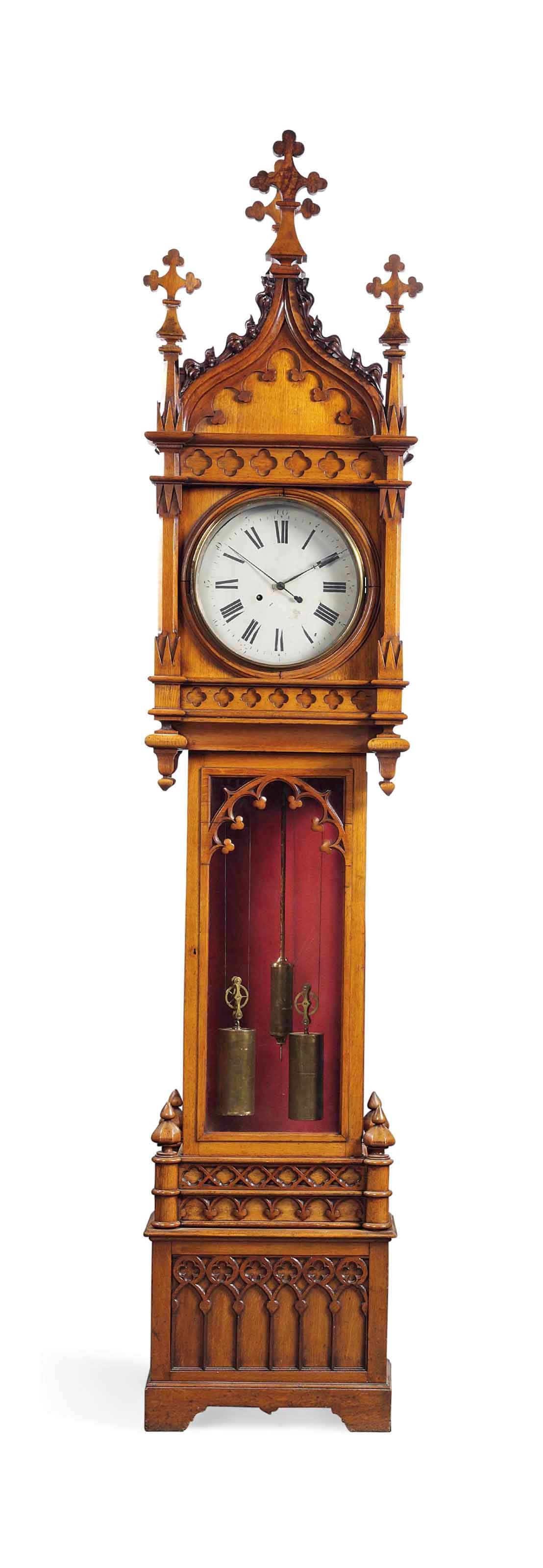 A VICTORIAN OAK STRIKING LONGCASE CLOCK