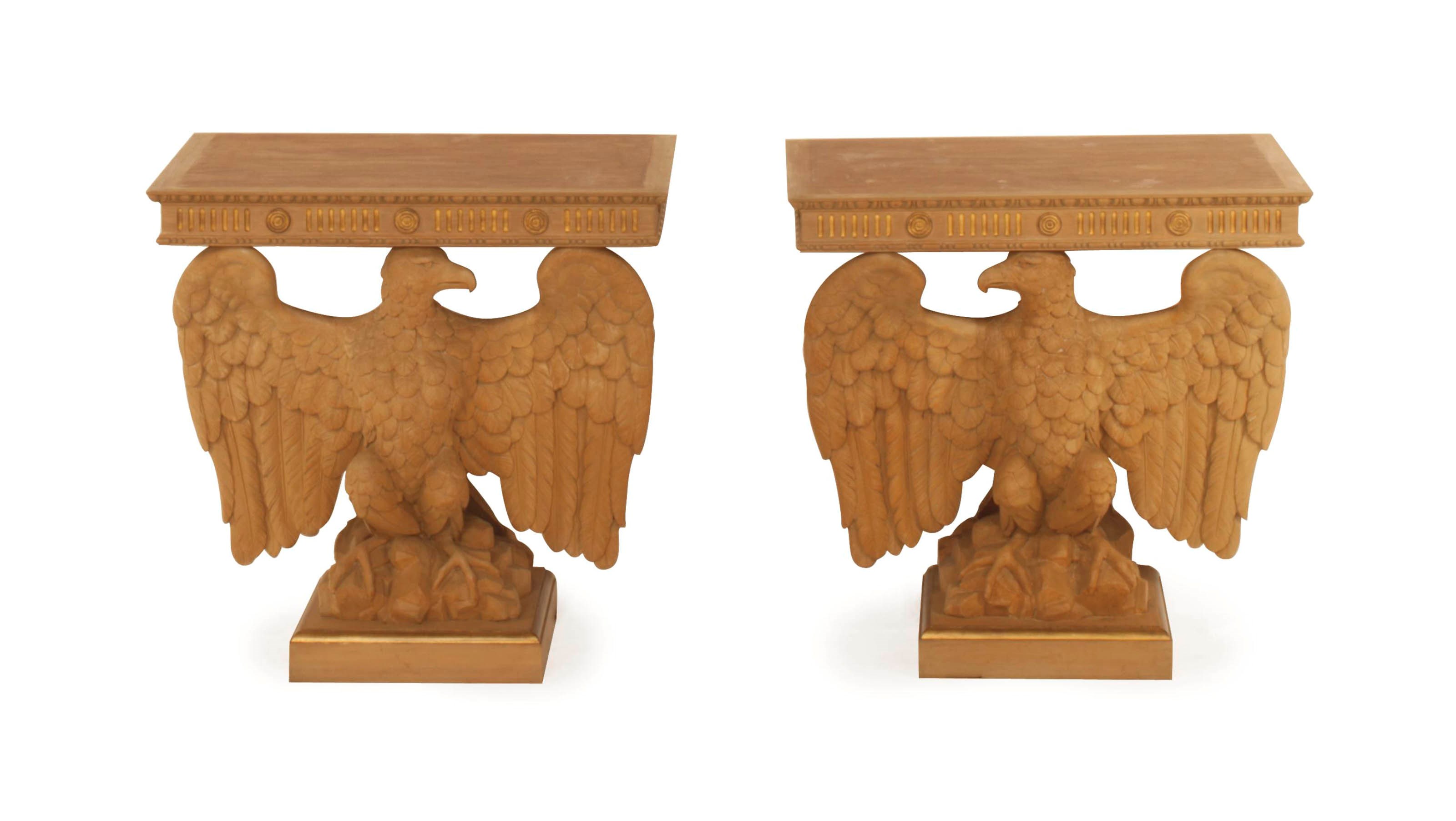 A PAIR OF CARVED PARCEL GILT CONSOLE TABLES,