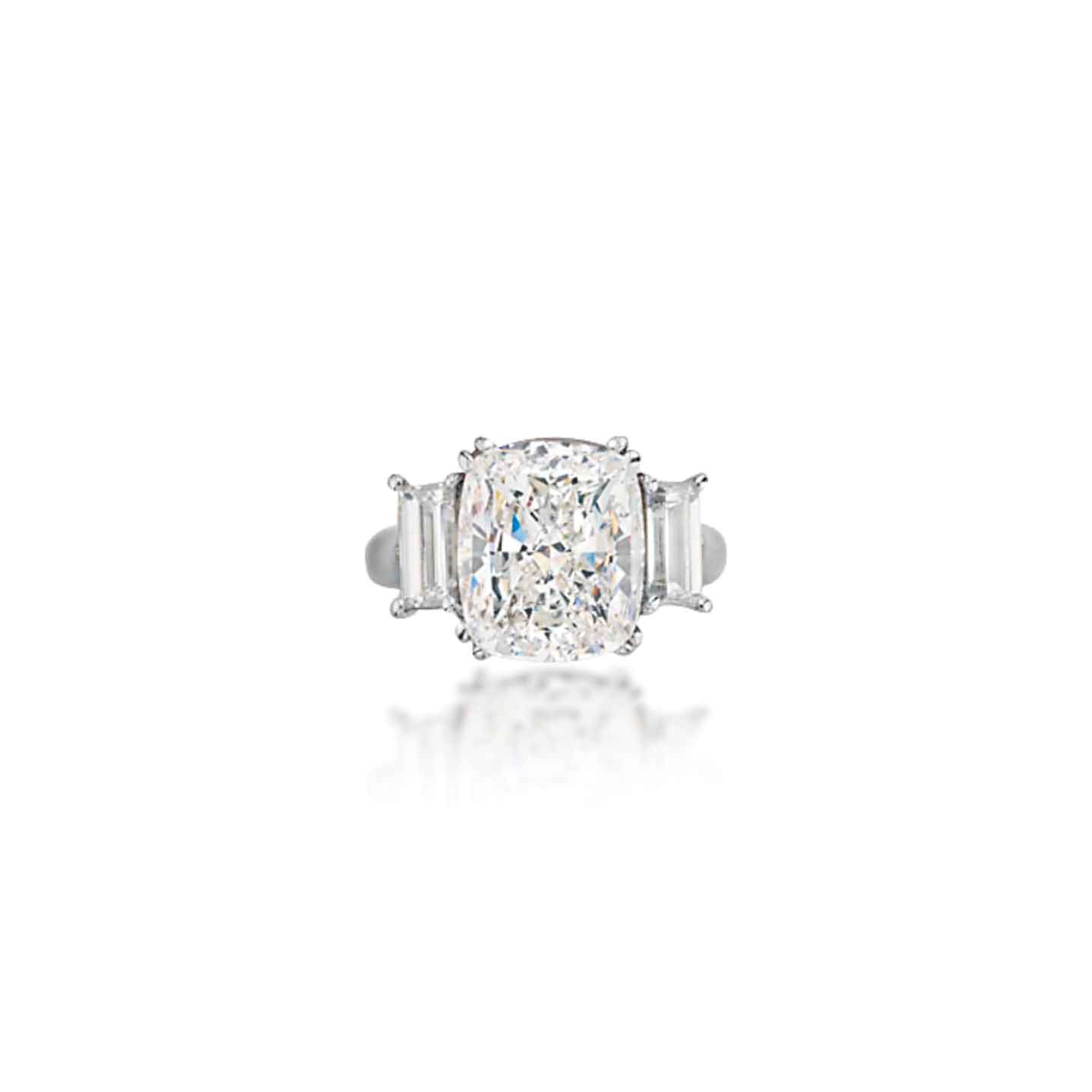 A DIAMOND THREE-STONE RING