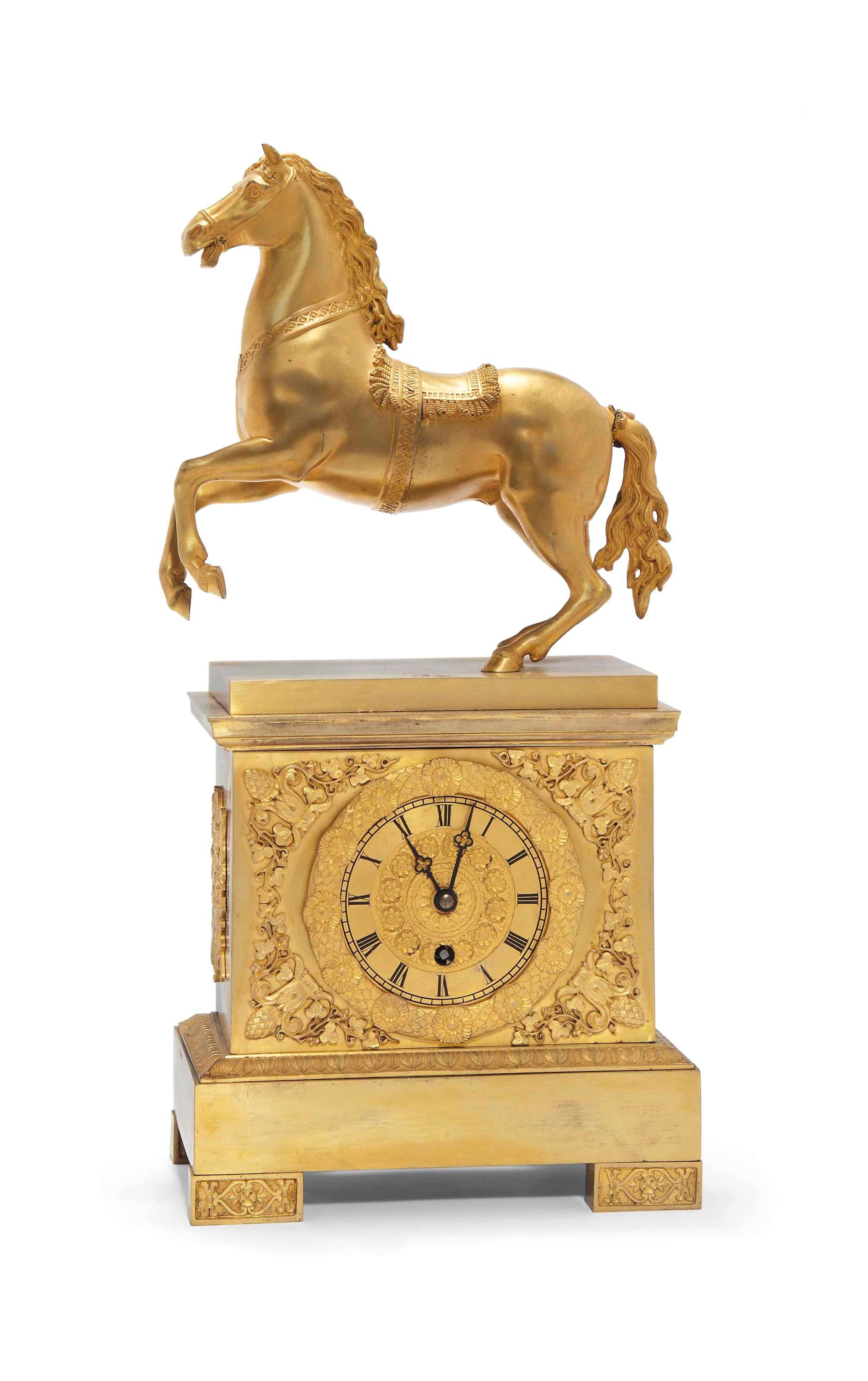 A FRENCH GILT BRONZE MANTEL CLOCK