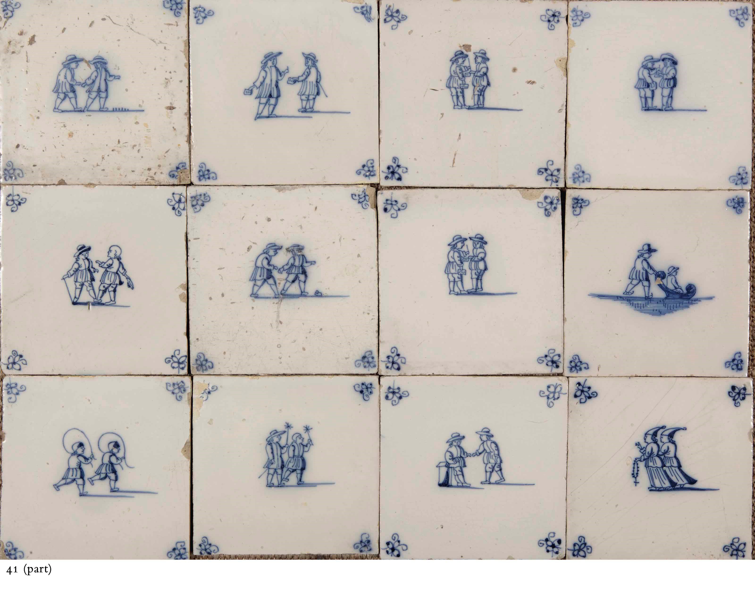 A collection of various Dutch blue and white tiles