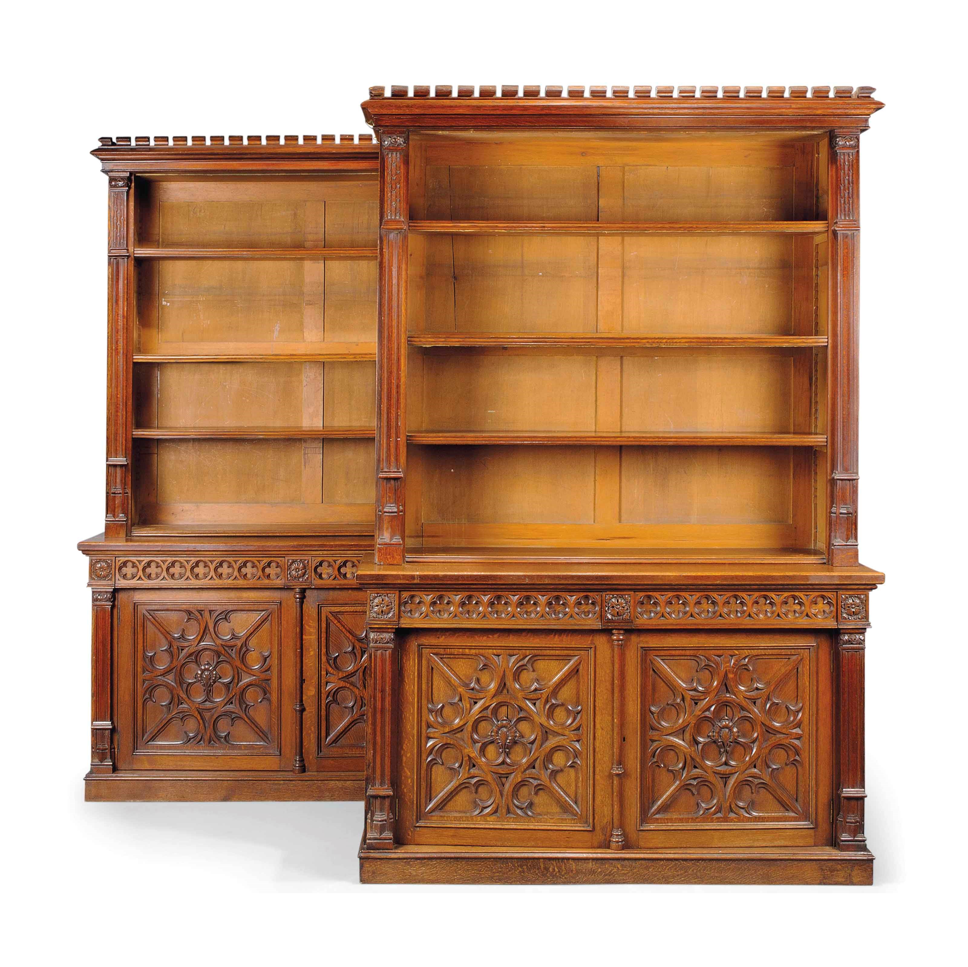 A PAIR OF LATE VICTORIAN OAK GOTHIC BOOKCASES