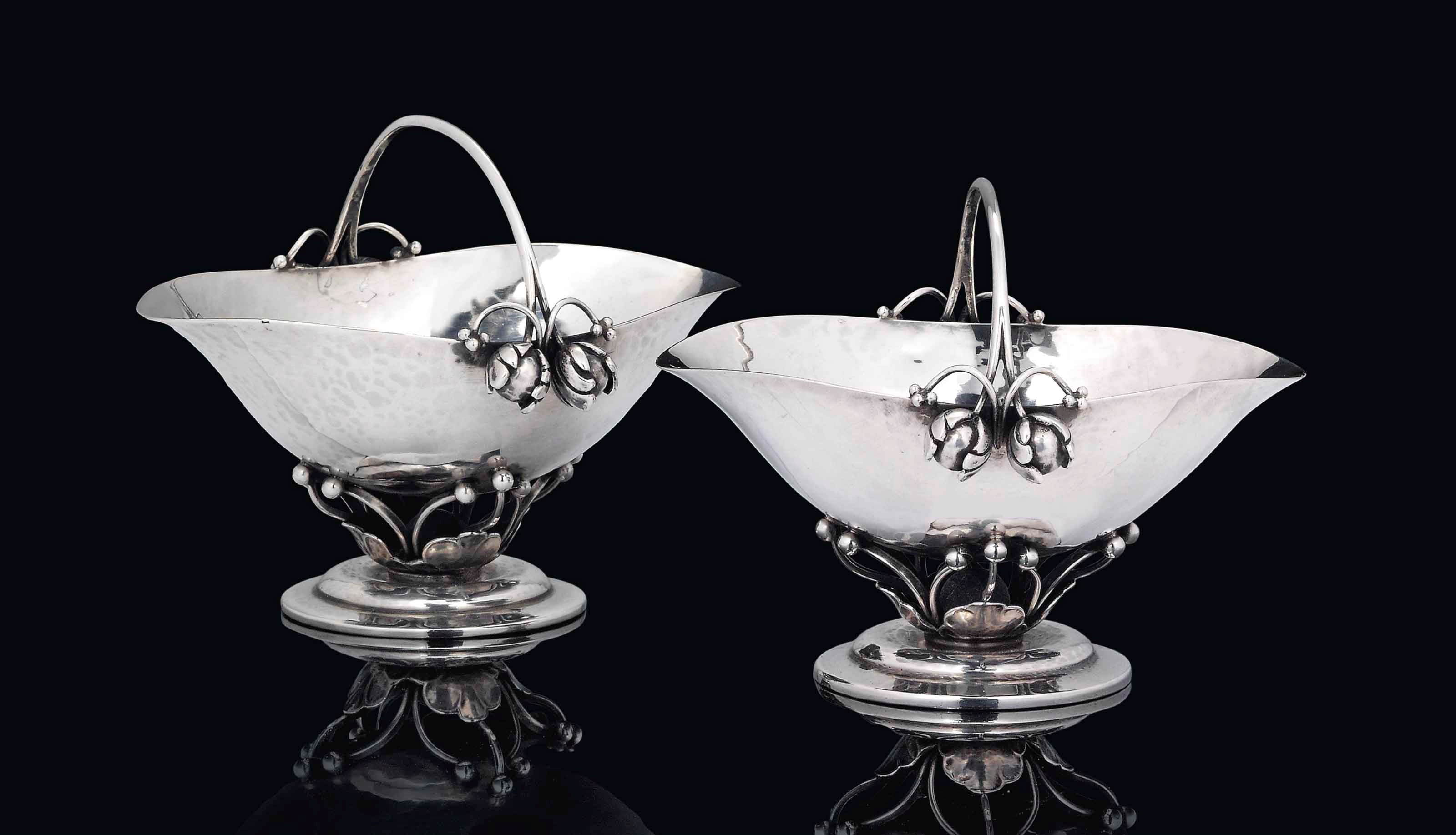 A PAIR OF GEORG JENSEN (EST.1904) SILVER SUGAR BOWLS DESIGNED BY GEORG JENSEN (1866-1935)