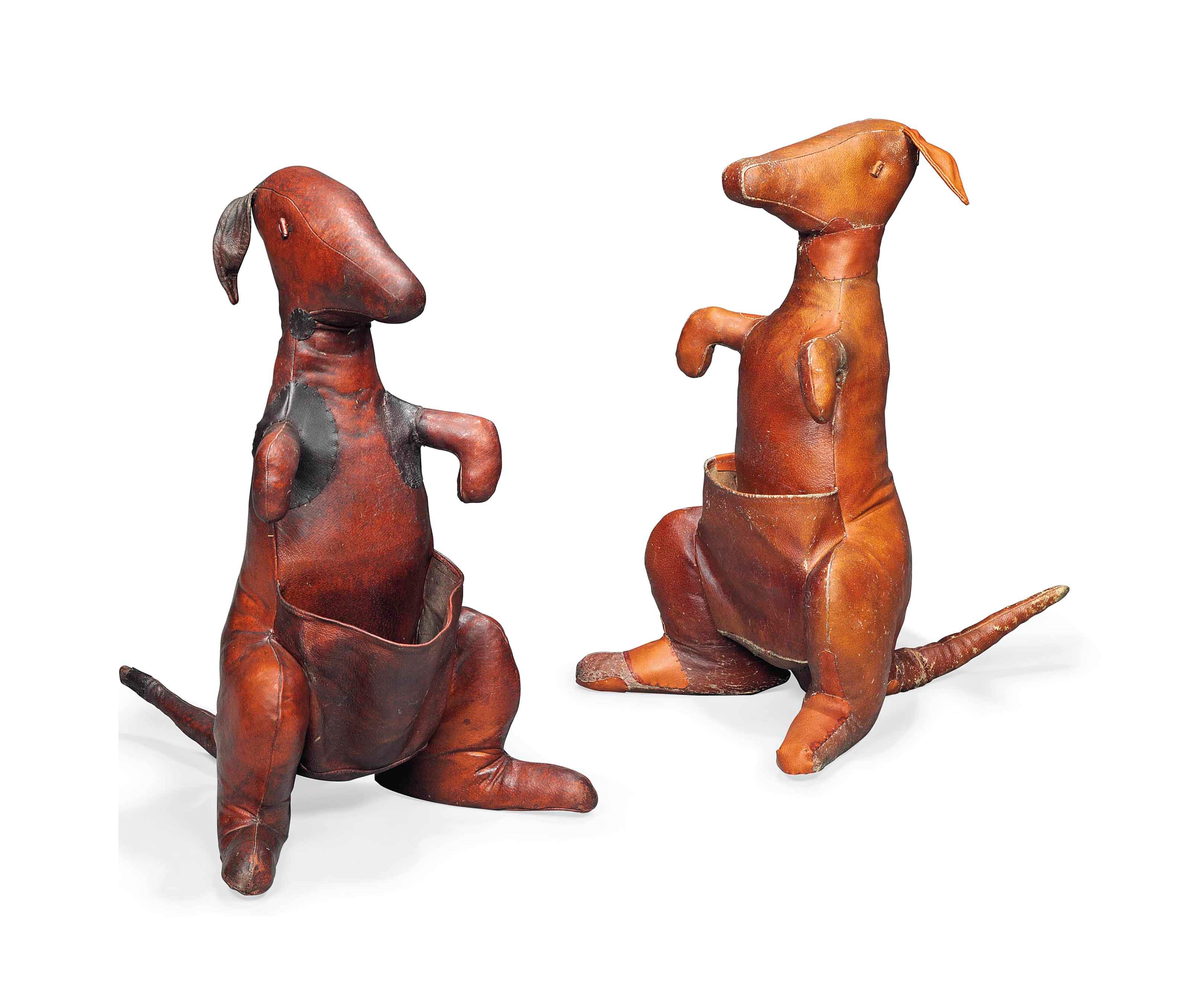 TWO LEATHER KANGAROO MAGAZINE RACKS