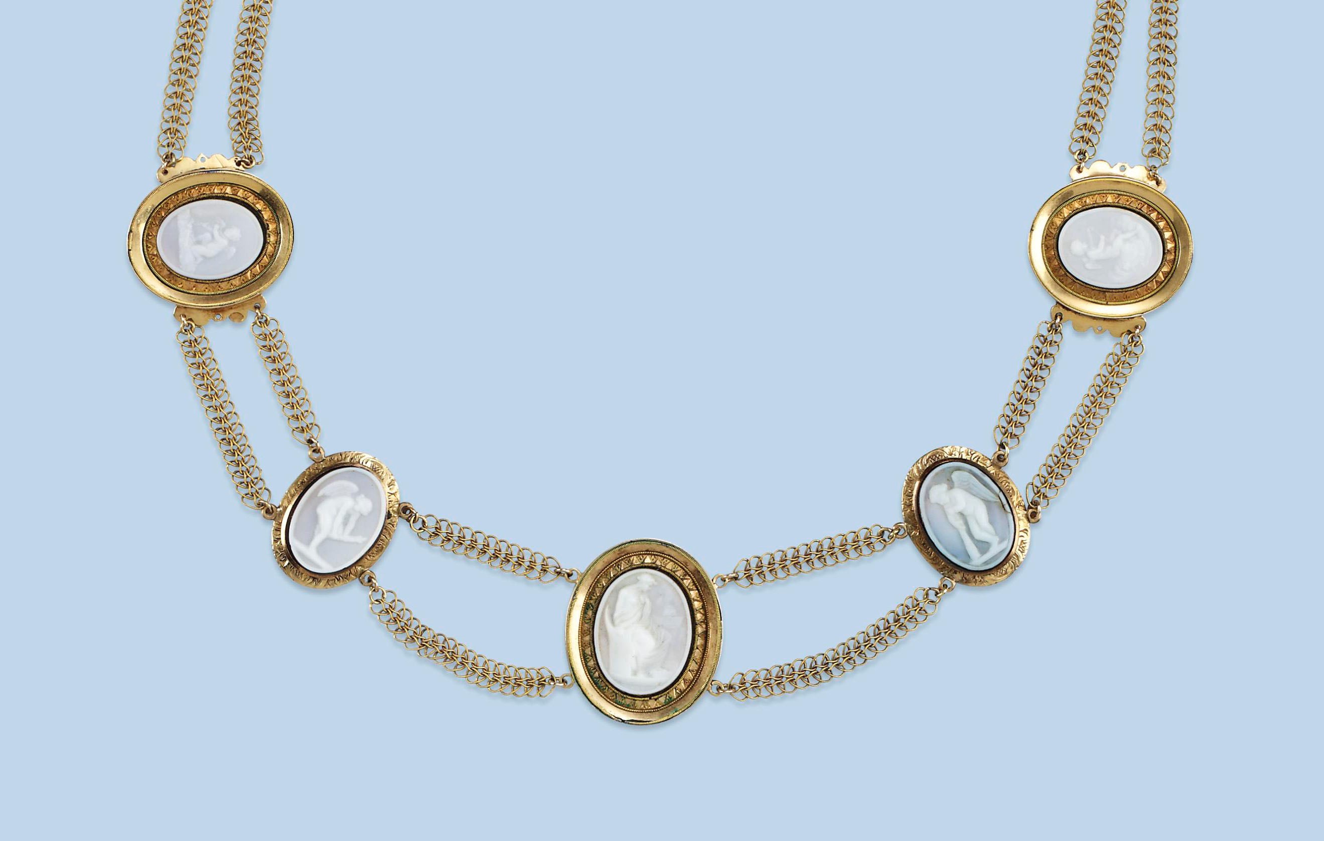 AN ANTIQUE PRESSED GLASS NECKLACE