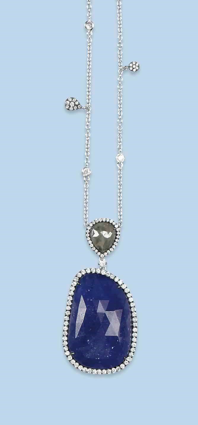 A TANZANITE AND DIAMOND PENDANT