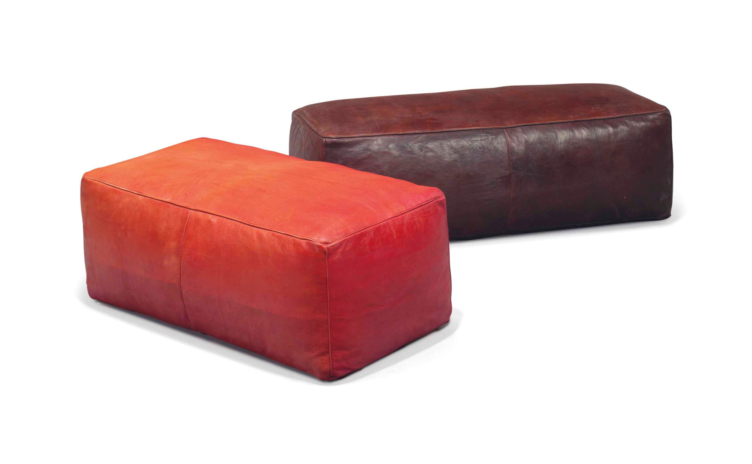 TWO LEATHER OTTOMANS