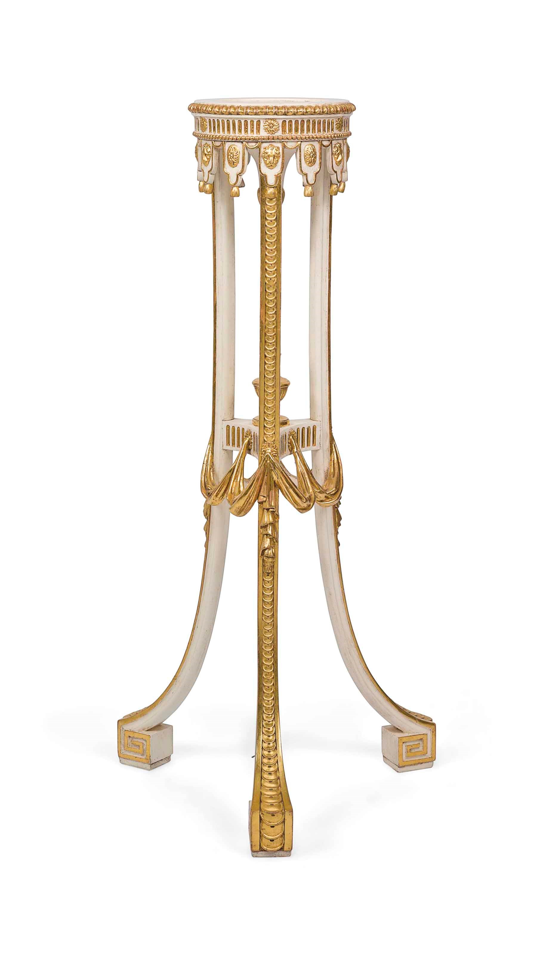 A GEORGE III-STYLE PARCEL-GILT AND CREAM-PAINTED TORCHERE