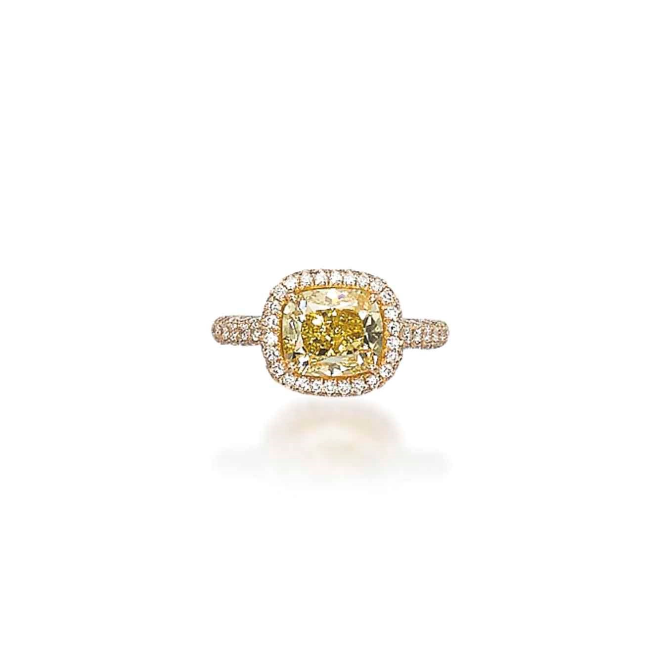 A COLOURED DIAMOND RING