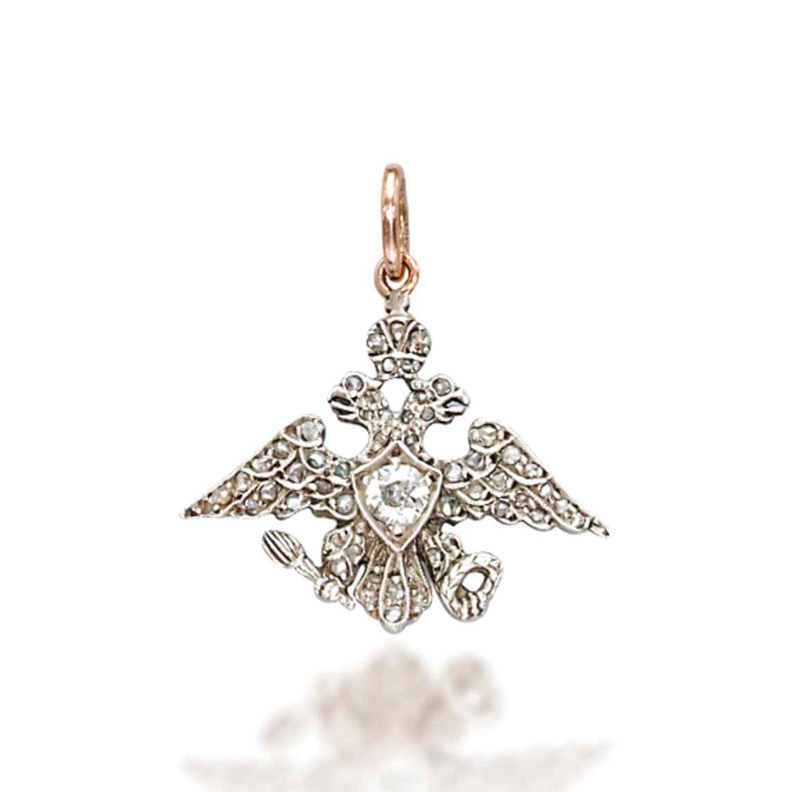 A DIAMOND PENDANT, BY FABERGÉ