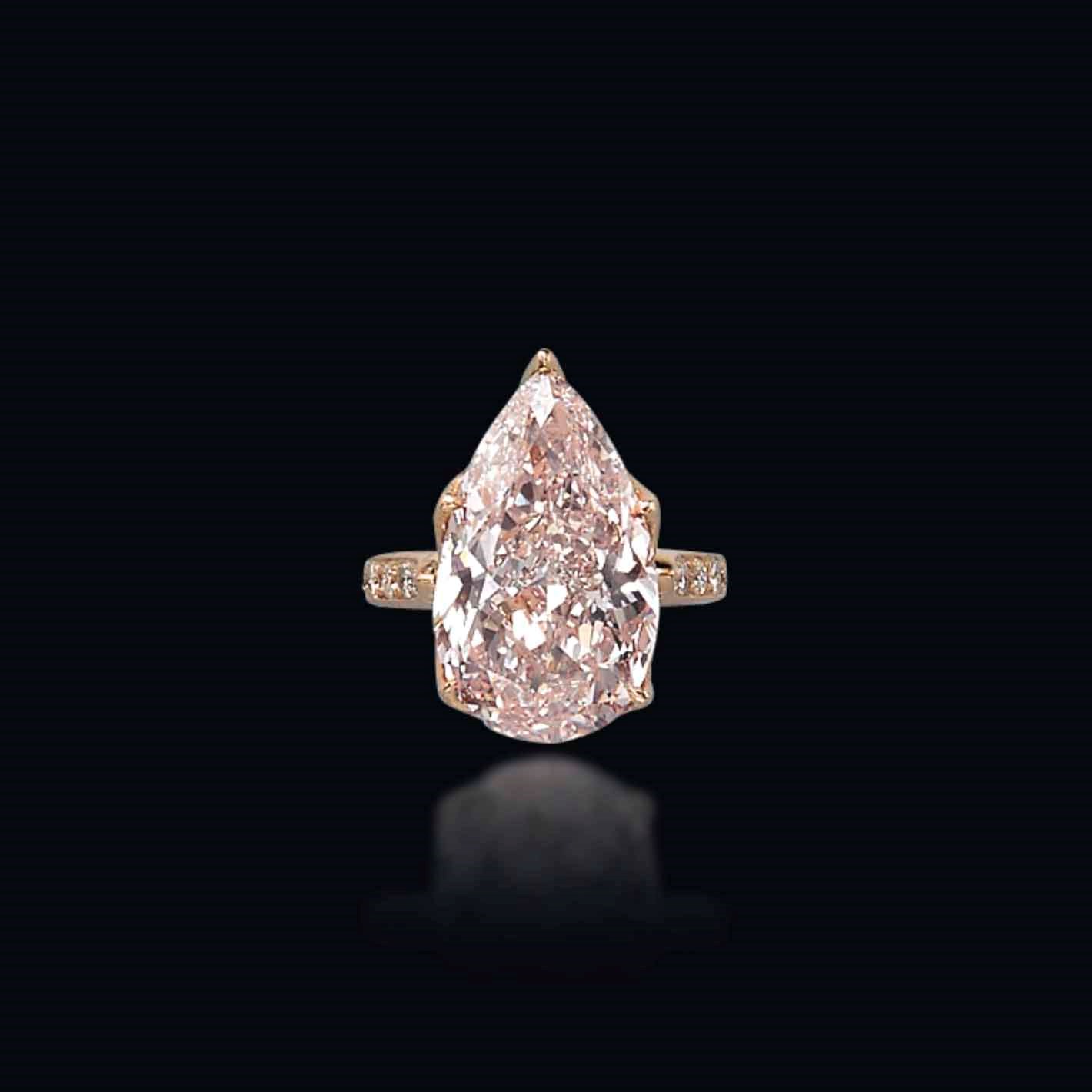 A COLOURED DIAMOND RING