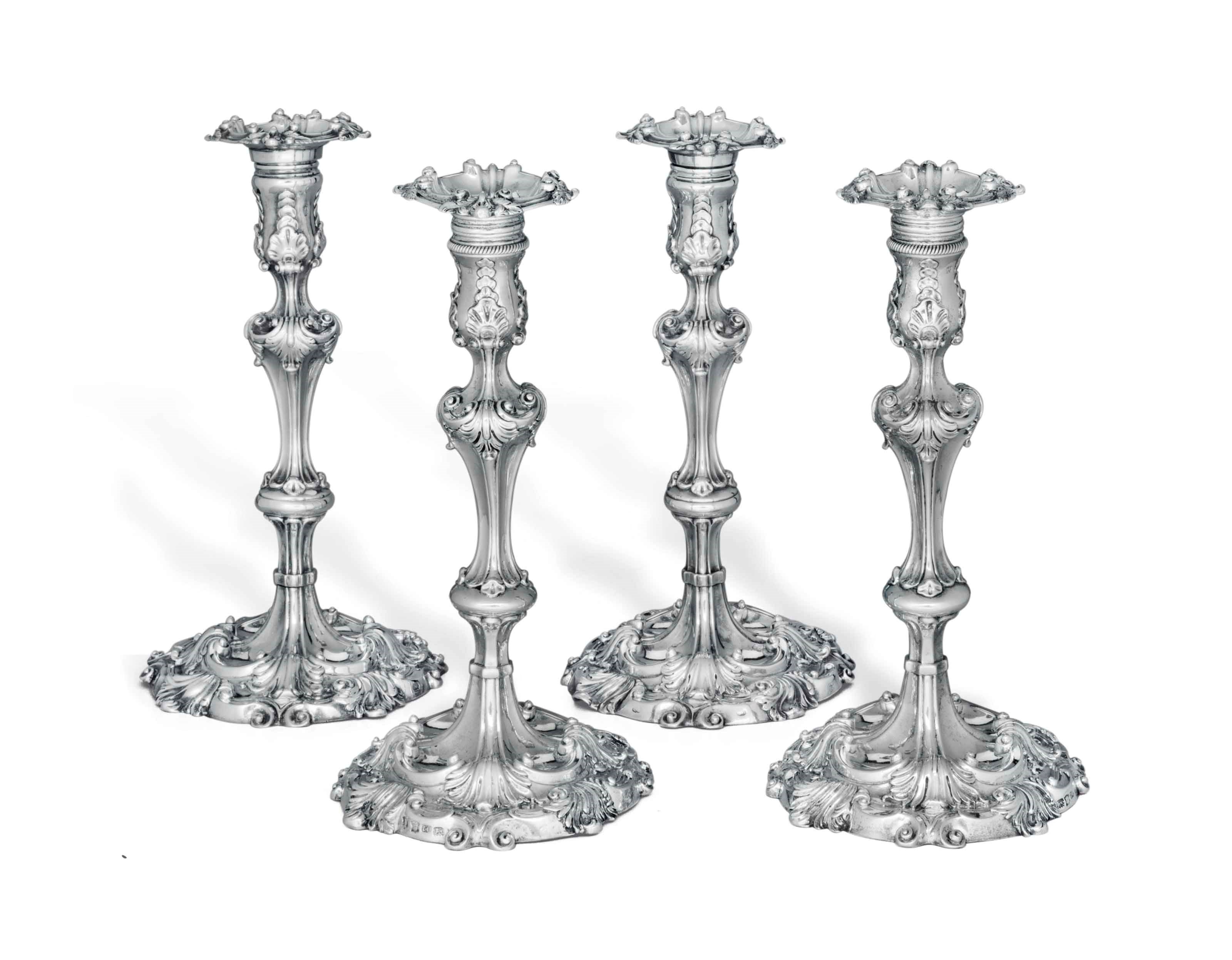 FOUR GEORGE II SILVER CANDLESTICKS
