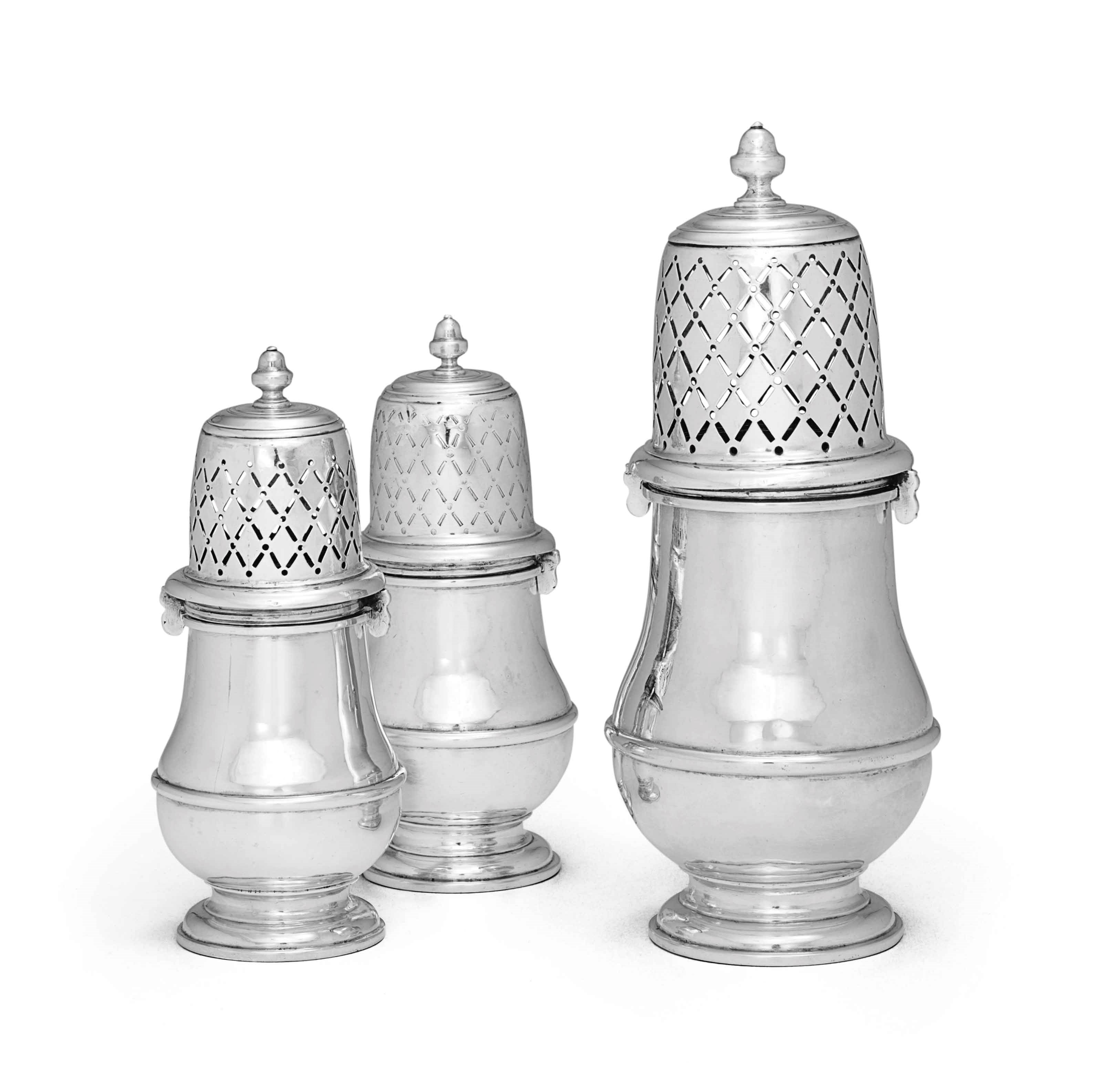 A RARE SET OF THREE QUEEN ANNE SCOTTISH SILVER CASTERS