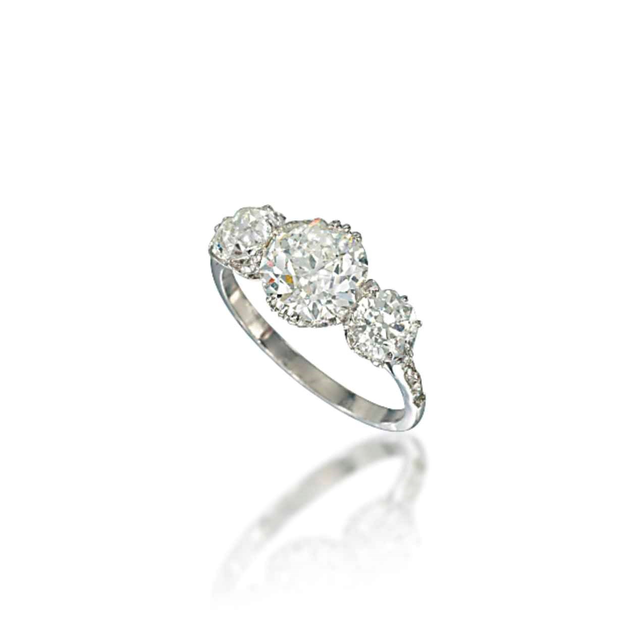 A DIAMOND THREE-STONE RING