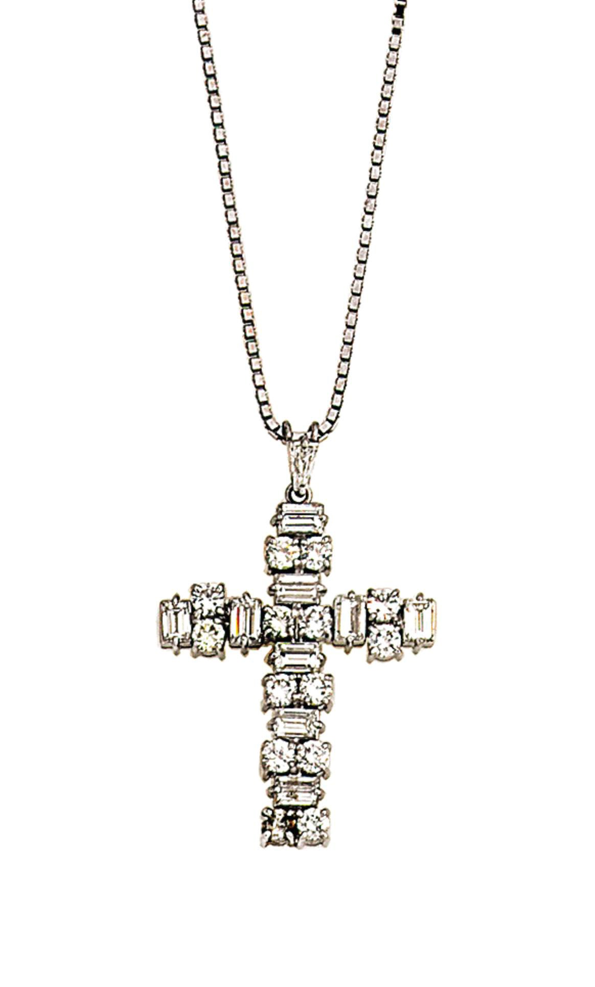 A diamond cross pendant
