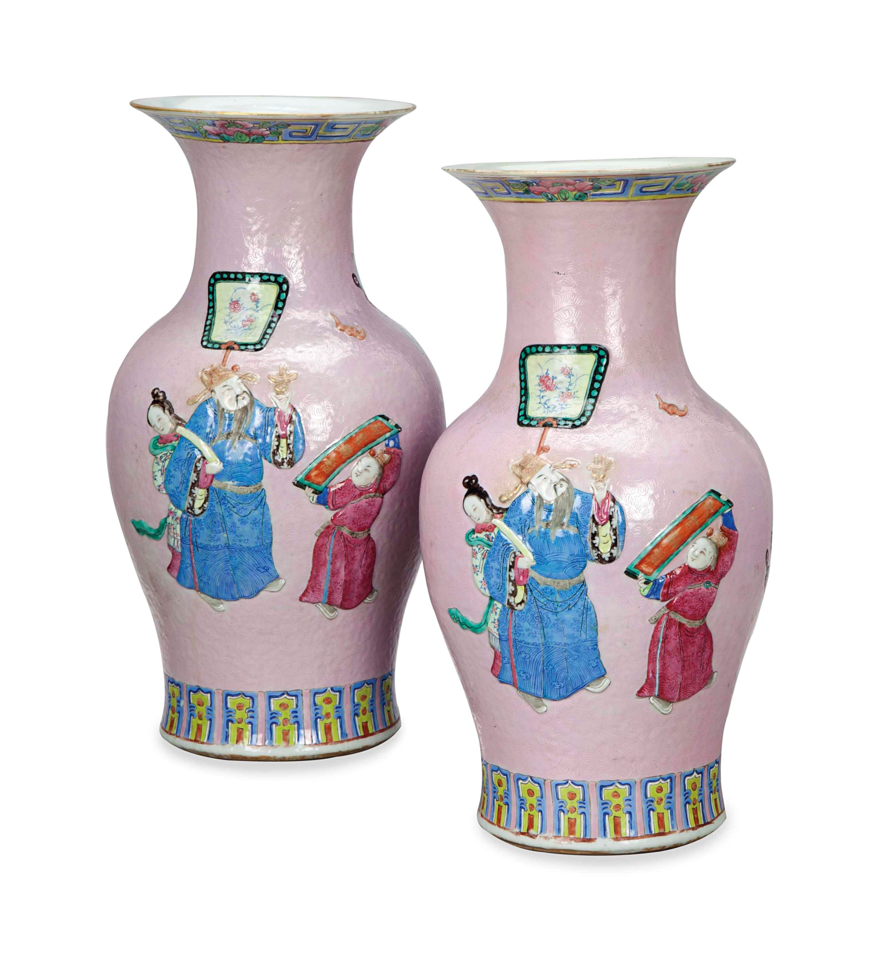 A PAIR OF PINK GROUND SGRAFFITO BALUSTER VASES