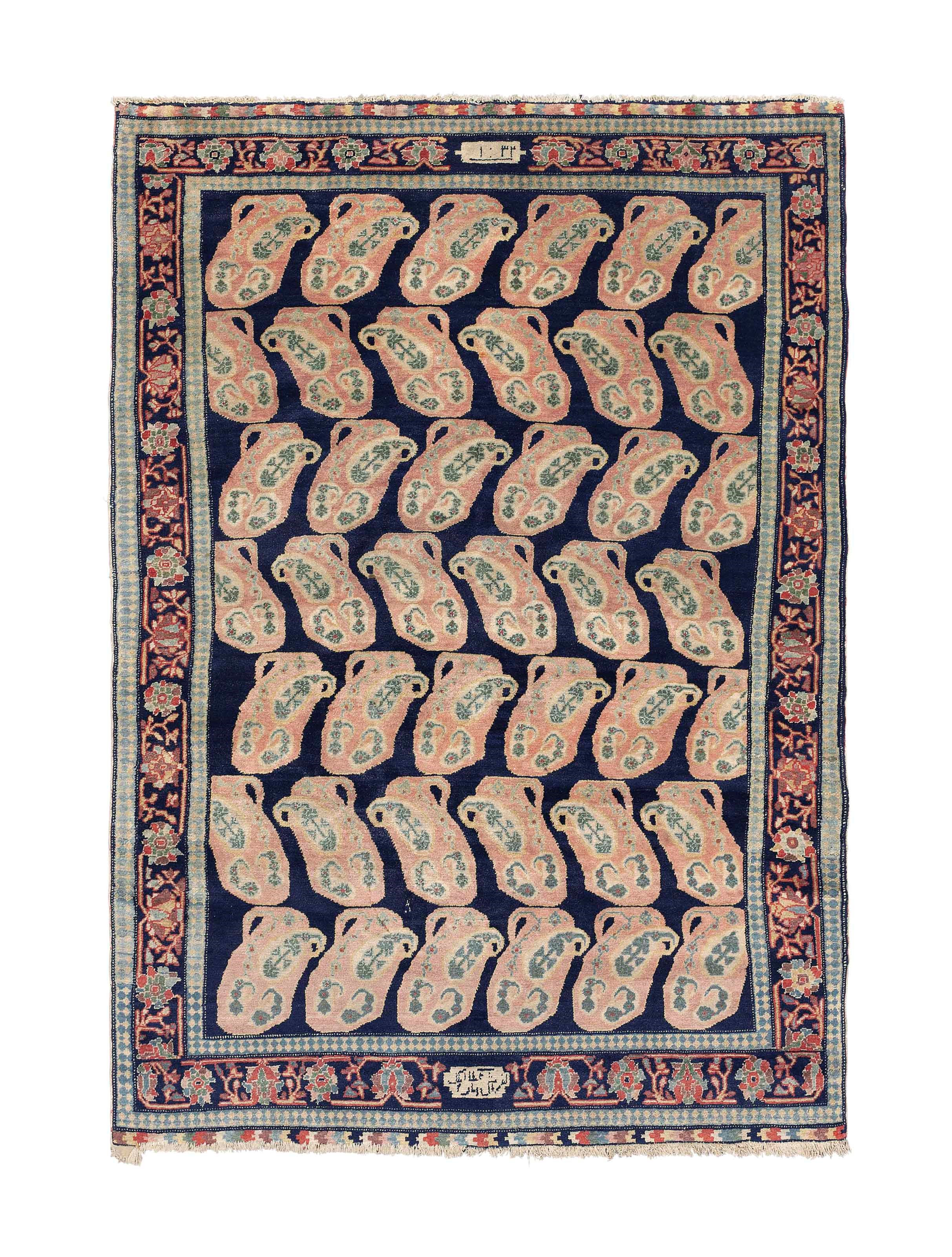 A fine antique Senneh rug