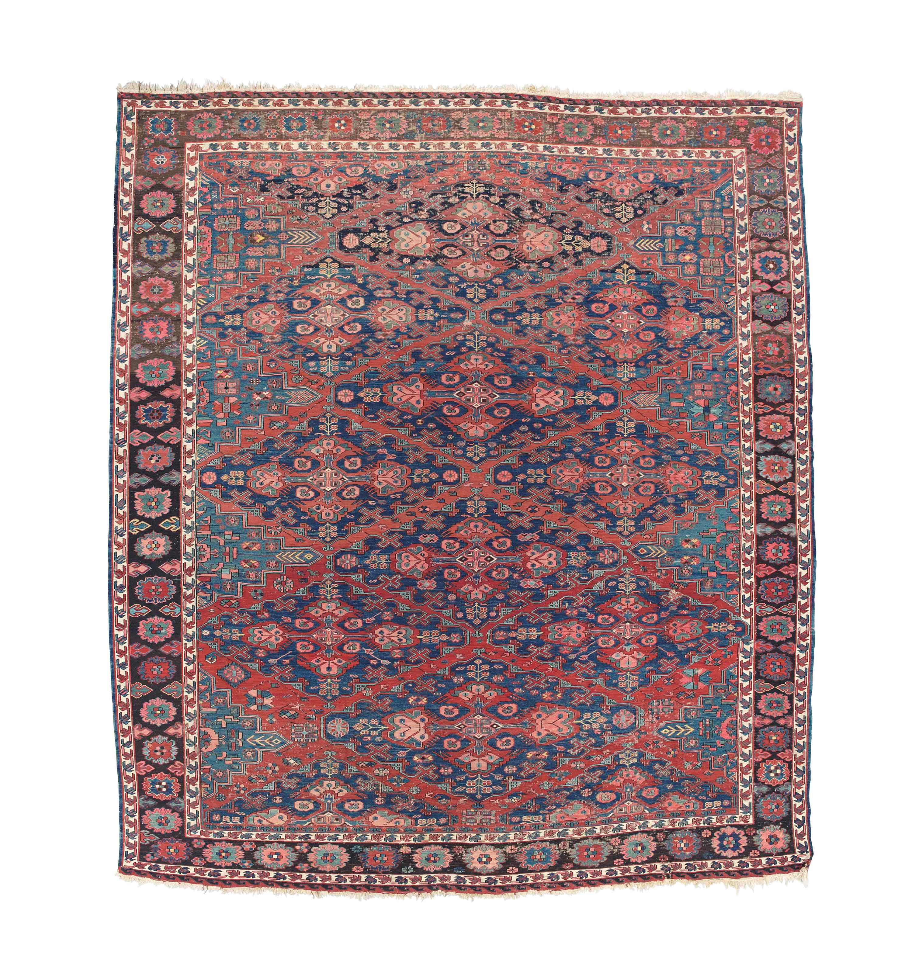 An antique Soumac carpet