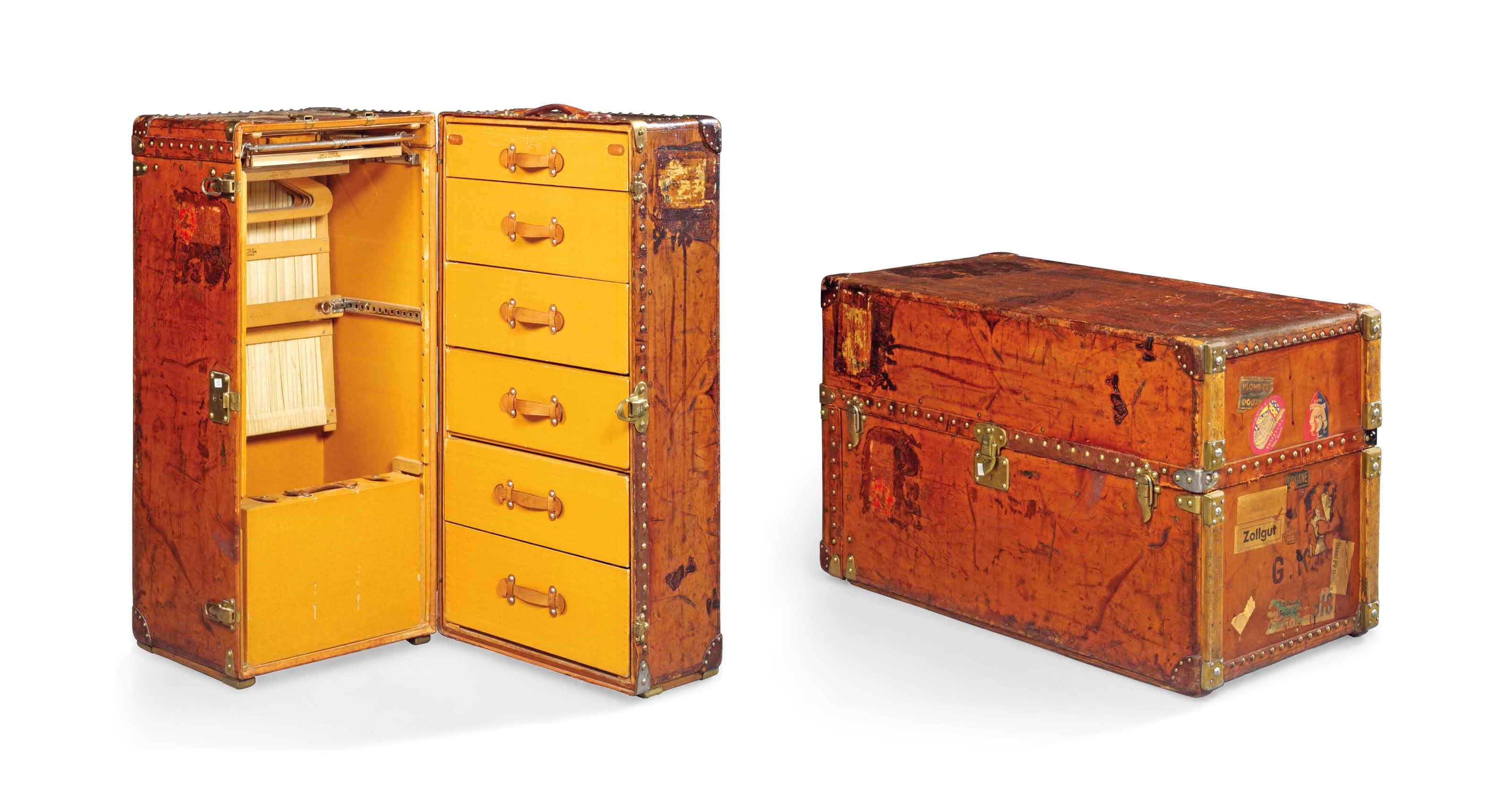 A WARDROBE TRUNK IN NATURAL COW HIDE