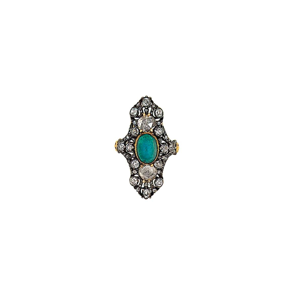 An emerald and diamond ring