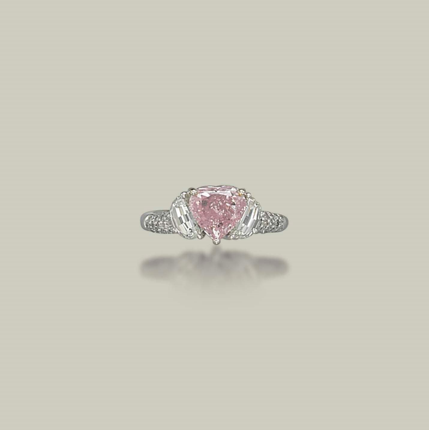 A COLOURED DIAMOND RING