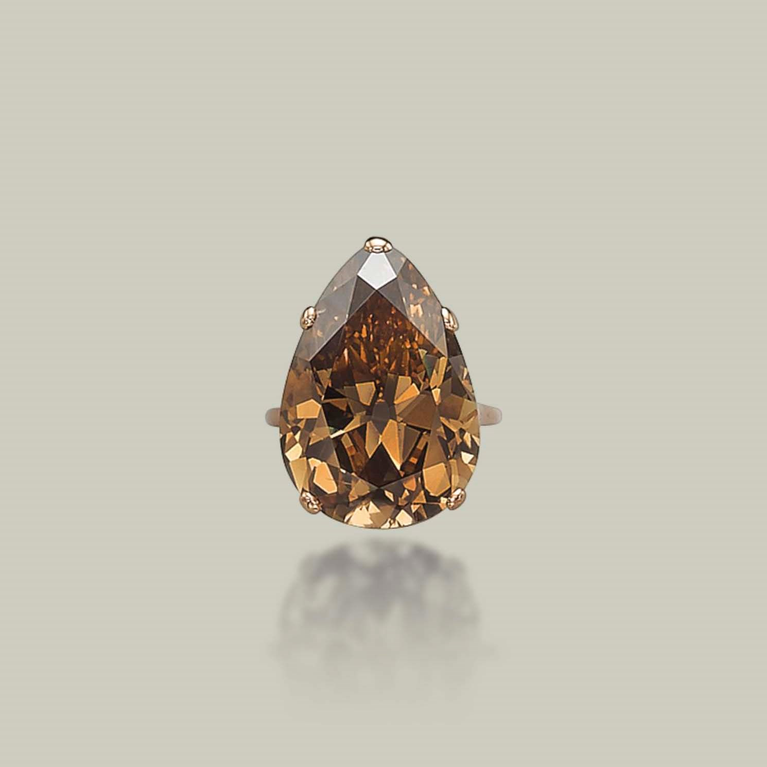A COLOURED DIAMOND RING