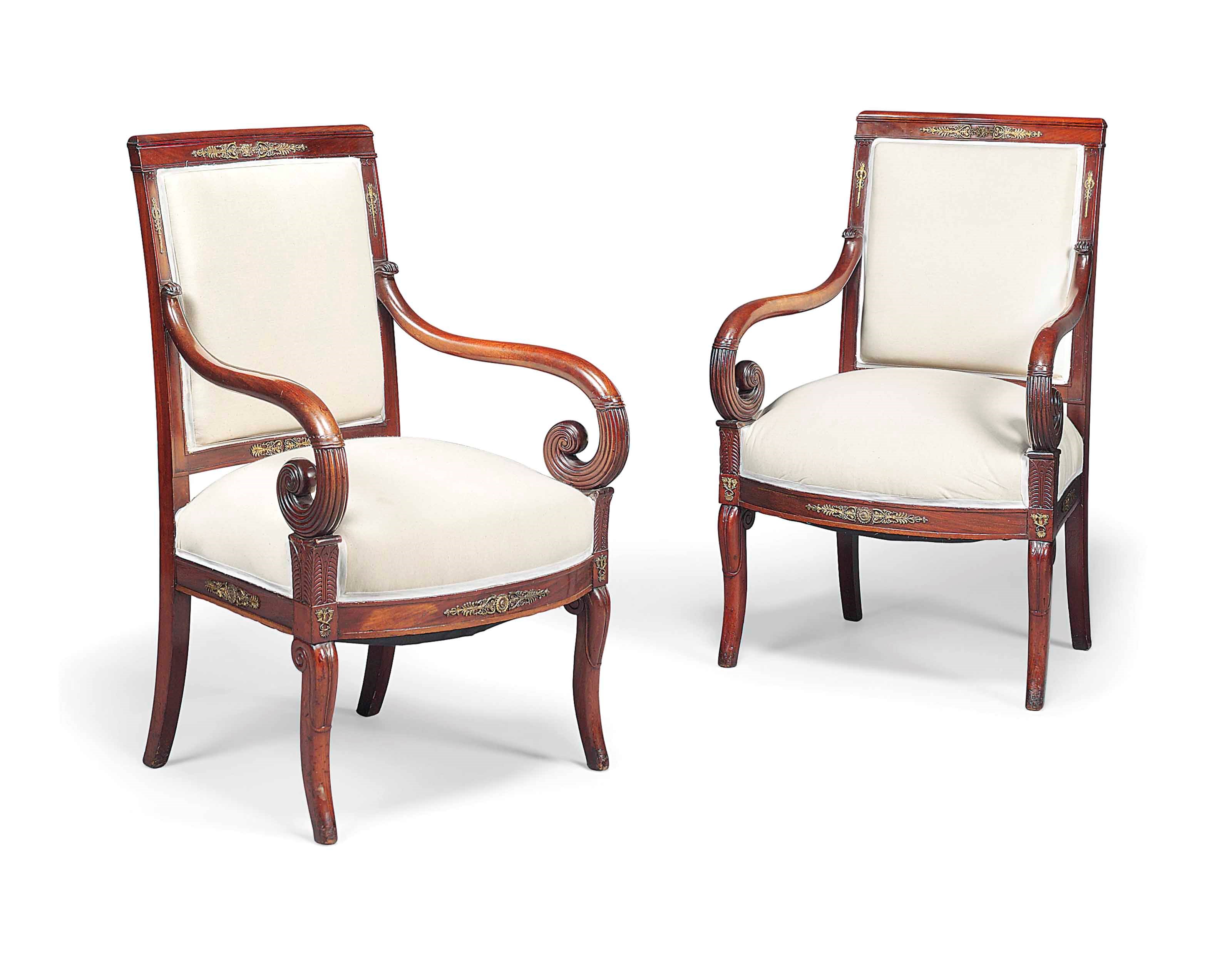A PAIR OF RESTAURATION GILT-METAL MOUNTED MAHOGANY FAUTEUILS