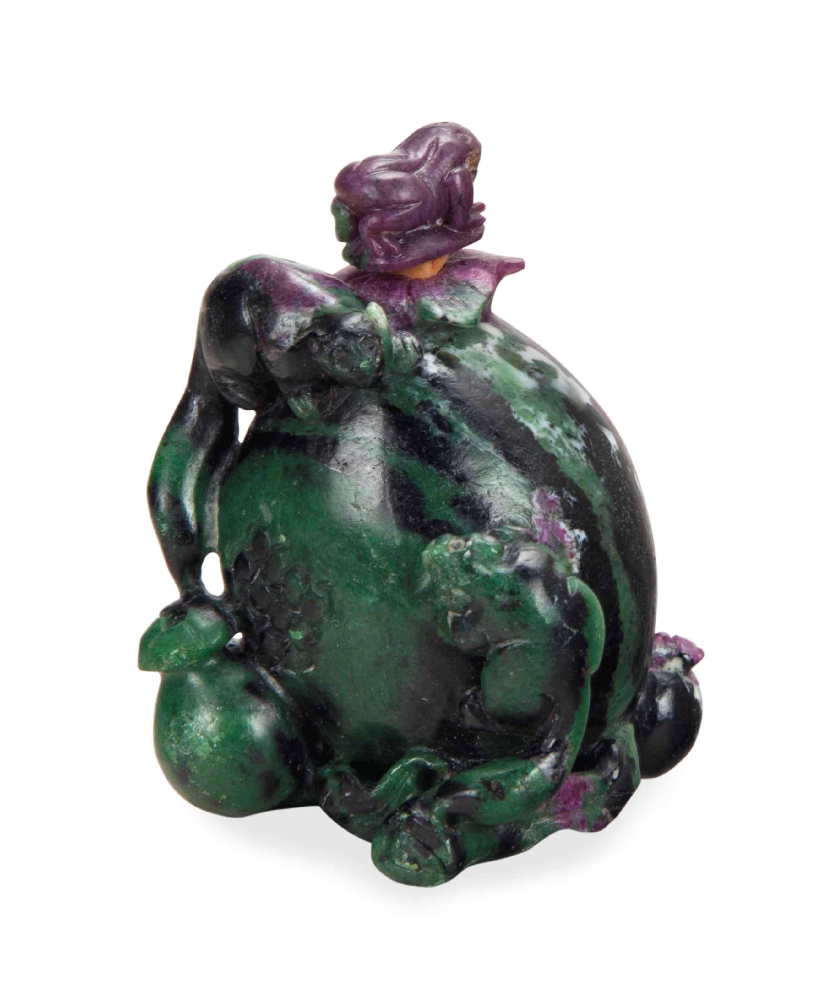 A CHINESE SMALL CARVED RUBY MATRIX SNUFF BOTTLE AND STOPPER,