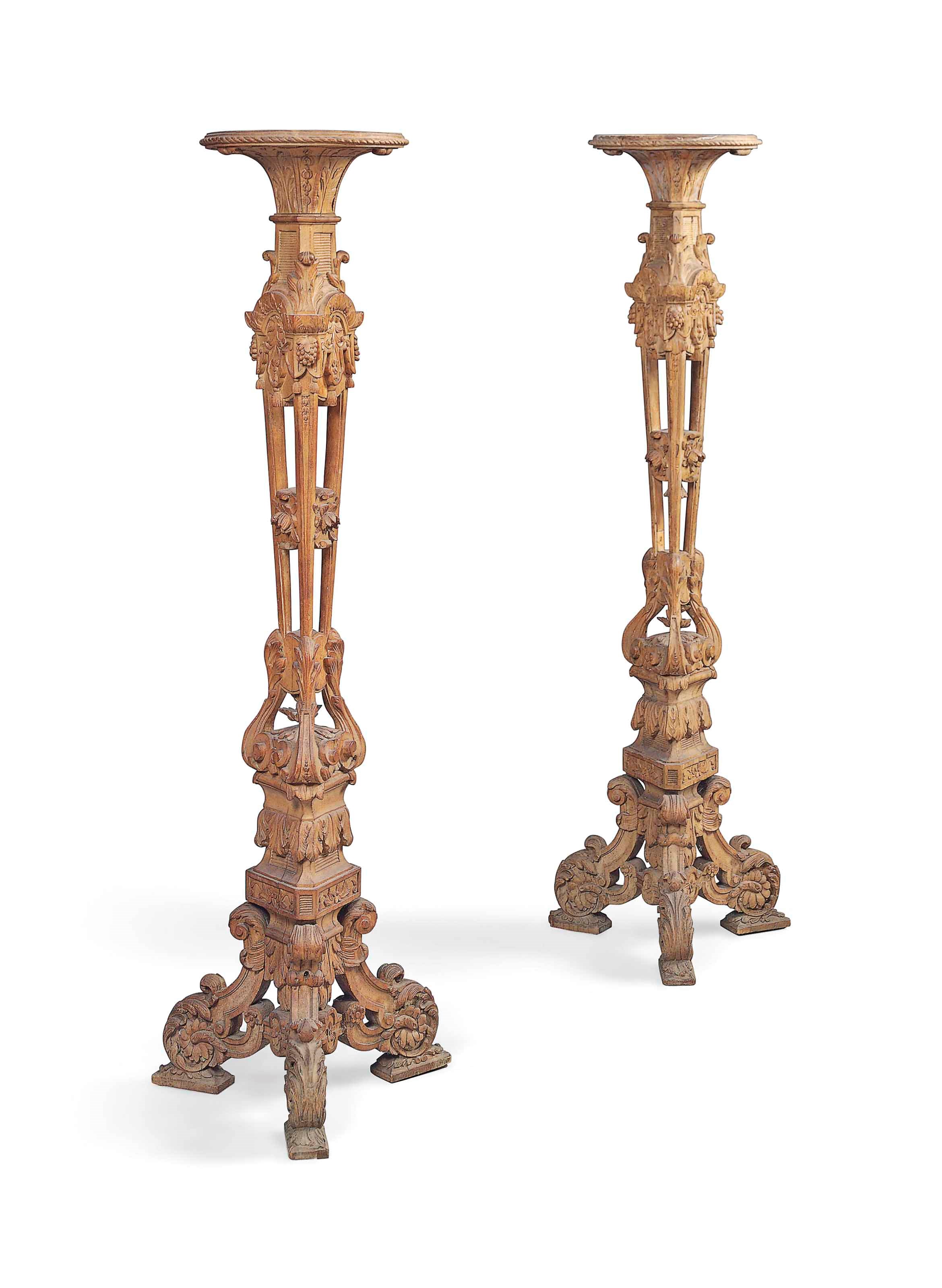 A PAIR OF BEECH TORCHERES