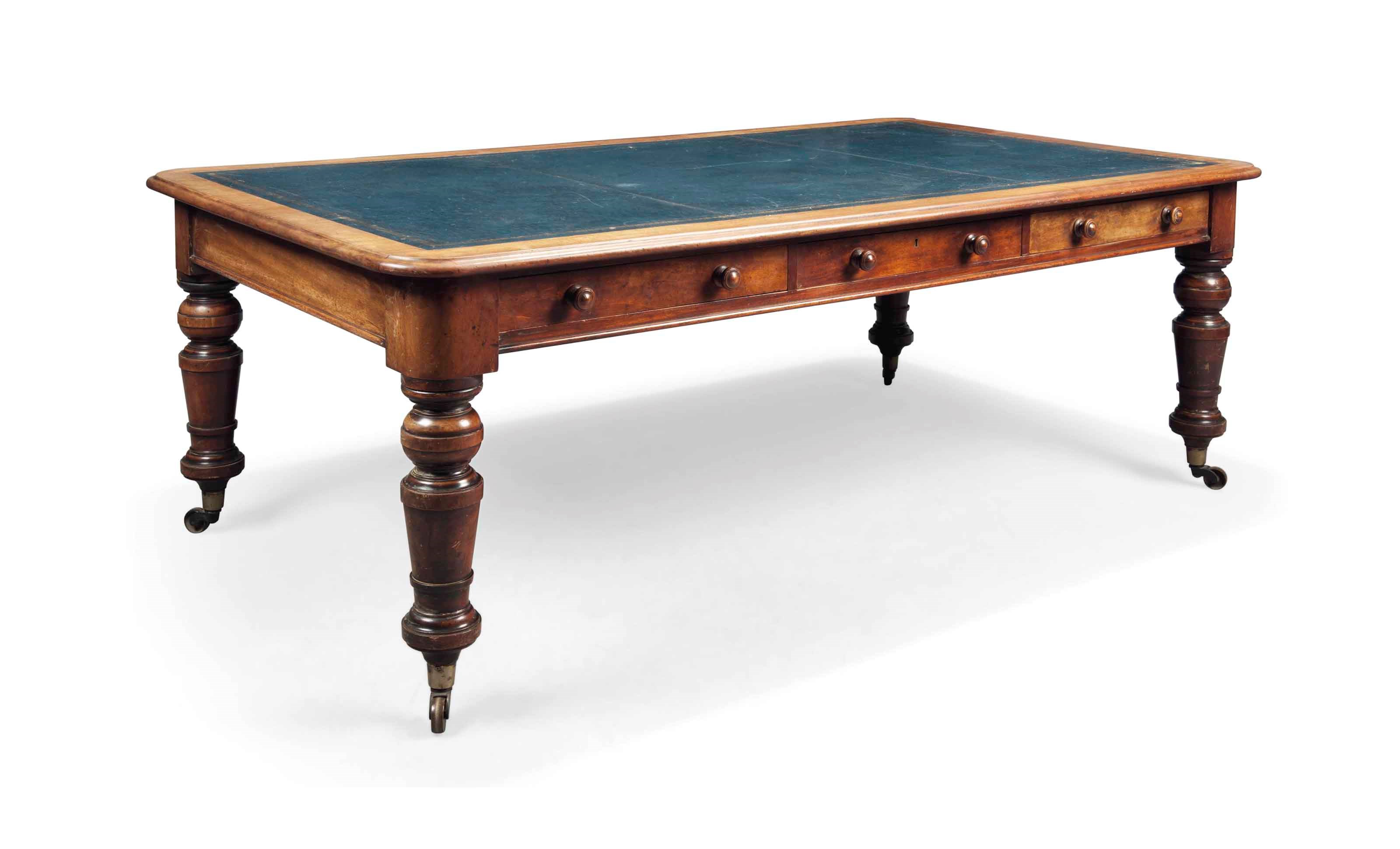 A  LARGE LATE VICTORIAN WALNUT PARTNERS' WRITING TABLE