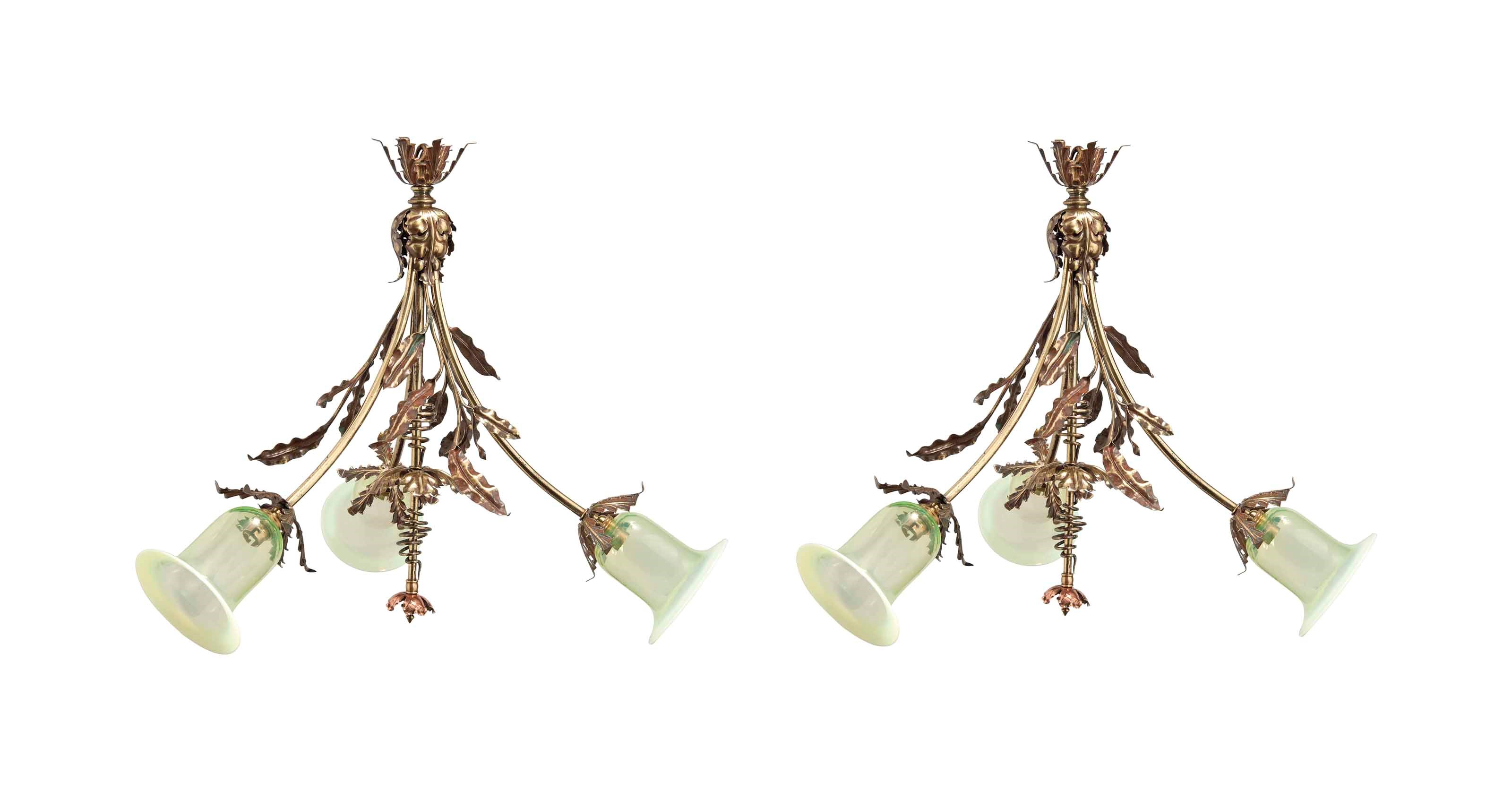 A PAIR OF COPPER AND BRASS THREE-LIGHT CHANDELIER